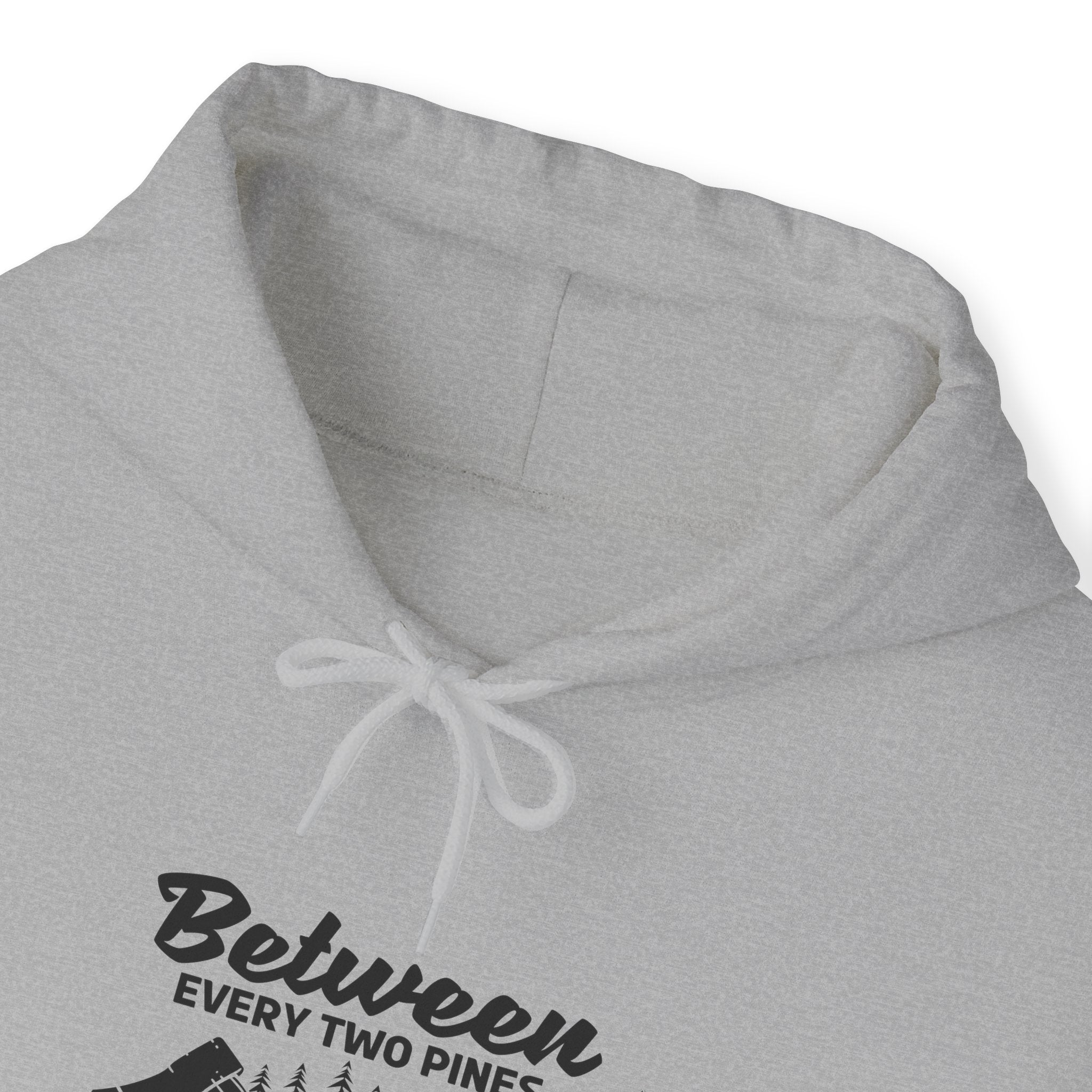 "Between Every Two Pines Is A Door To New World" Unisex Heavy Blend™ Hooded Sweatshirt