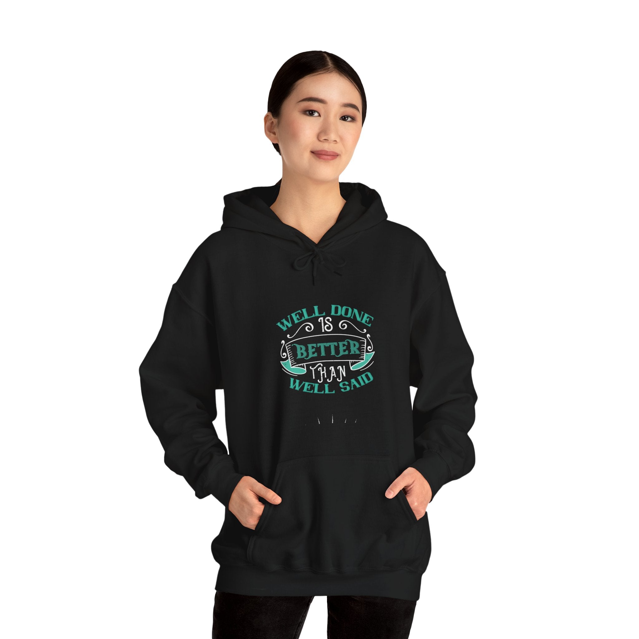 "Well done is better than well said"  Unisex Heavy Blend™ Hooded Sweatshirt