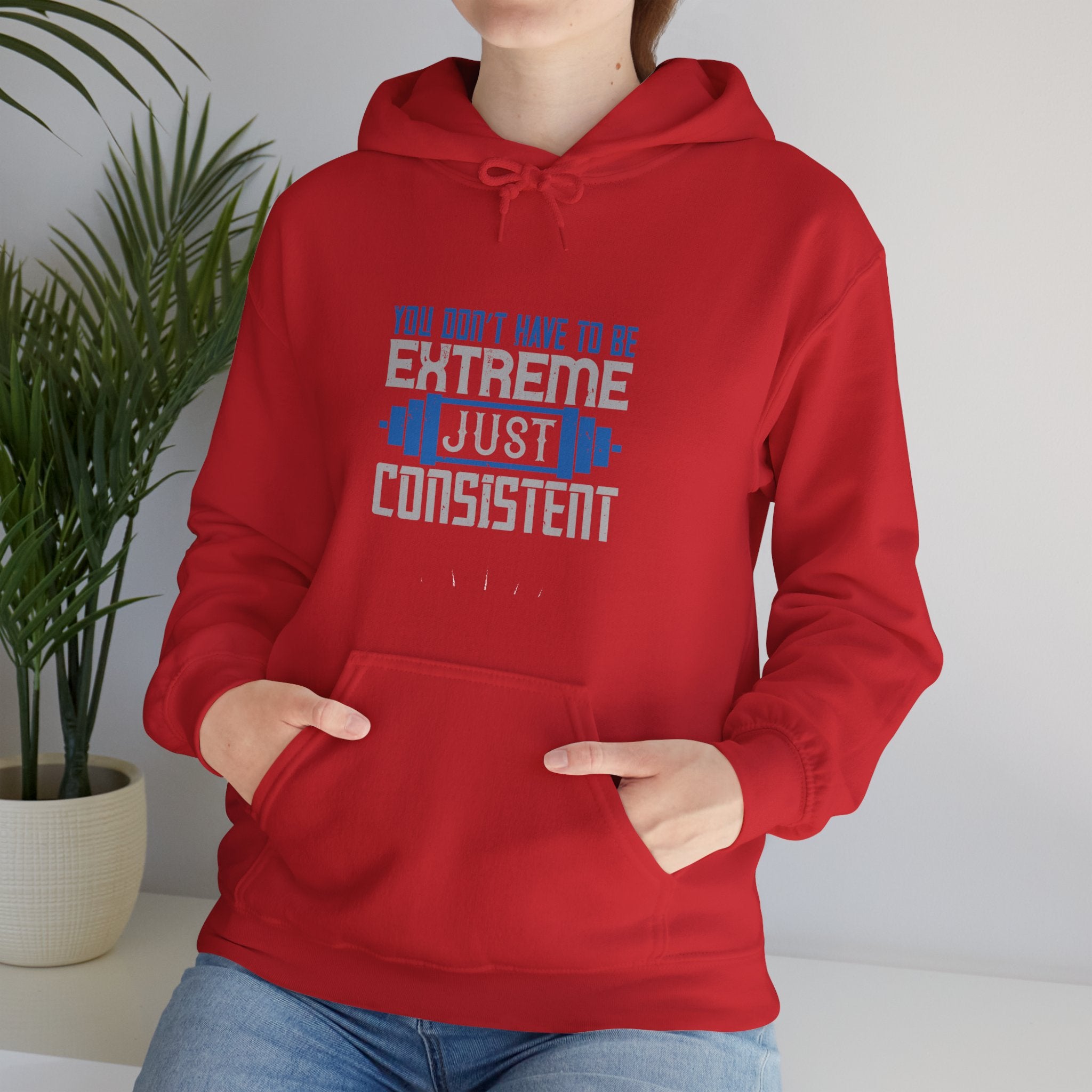 "You don’t have to be extreme, just consistent" Unisex Heavy Blend™ Hooded Sweatshirt