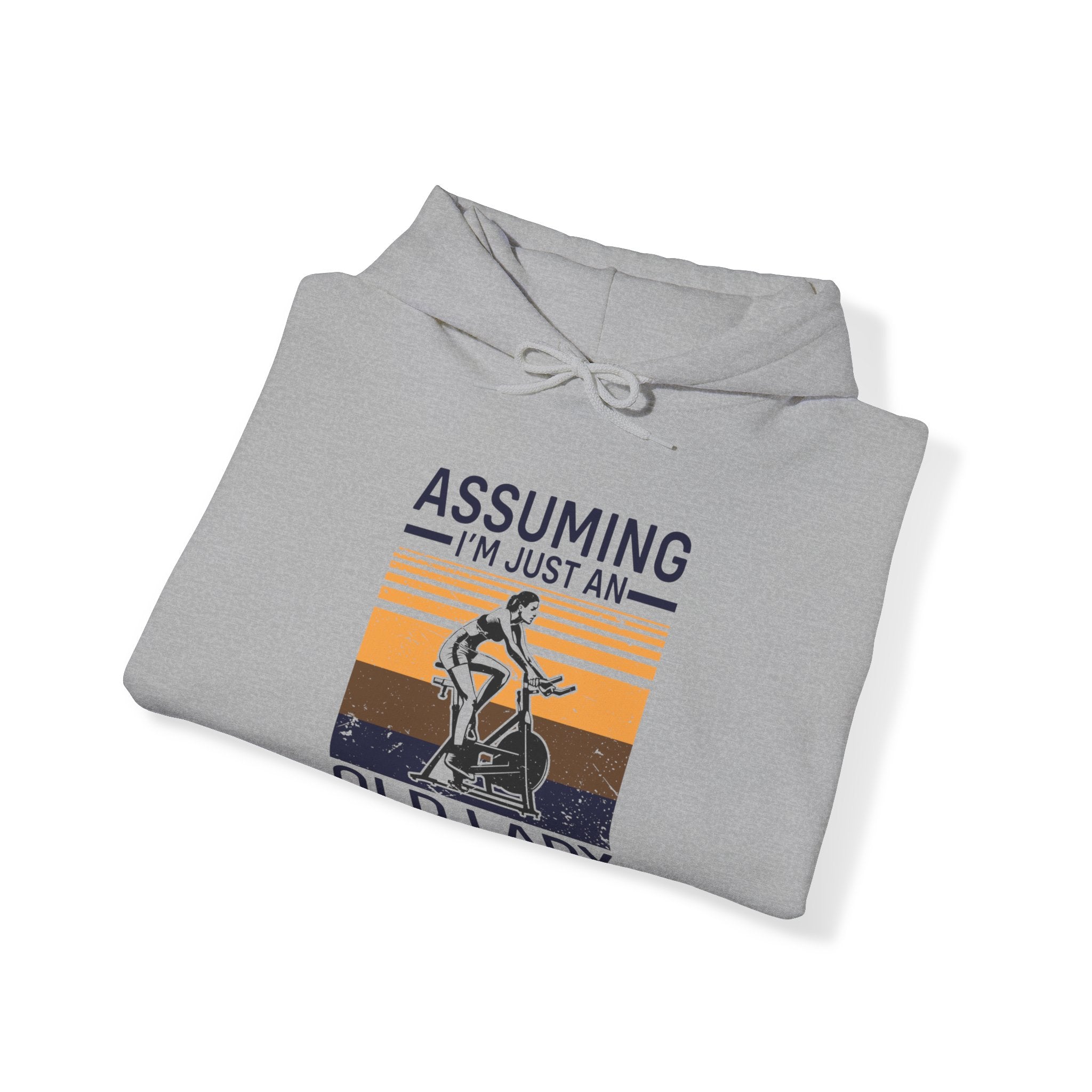 "Assuming I M Just An Old Lady Was Your First Mistake"  Unisex Heavy Blend™ Hooded Sweatshirt