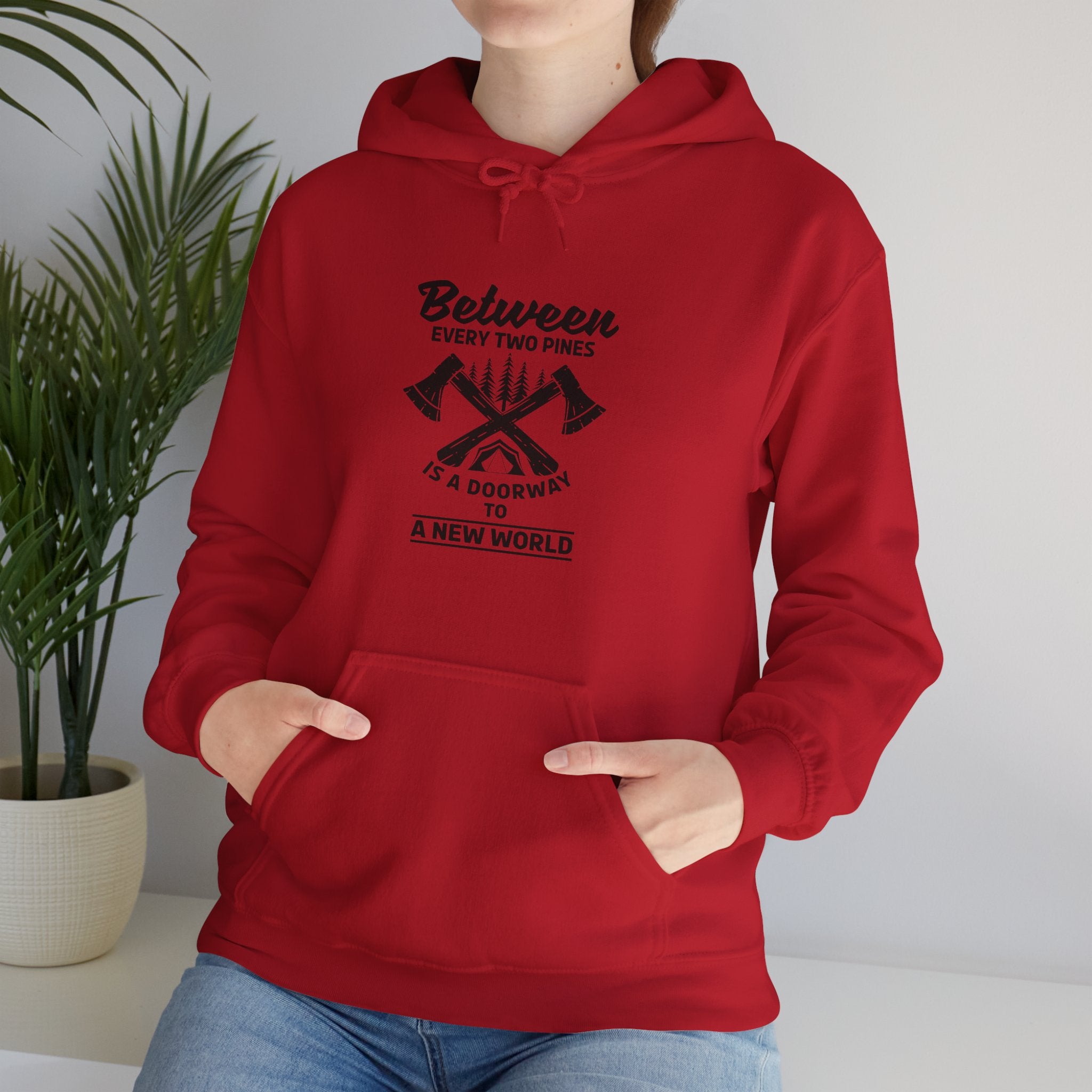 "Between Every Two Pines Is A Door To New World" Unisex Heavy Blend™ Hooded Sweatshirt