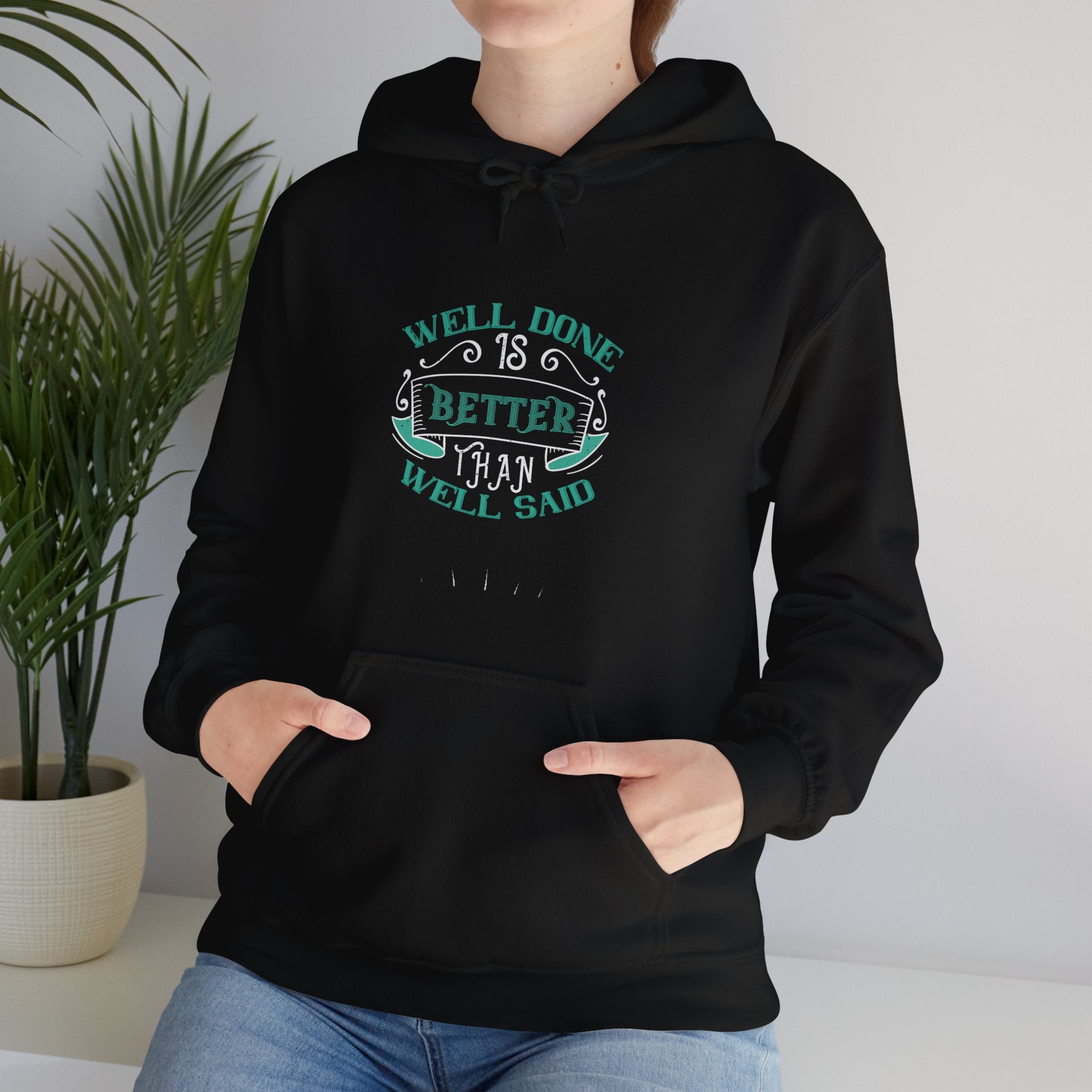 "Well done is better than well said"  Unisex Heavy Blend™ Hooded Sweatshirt