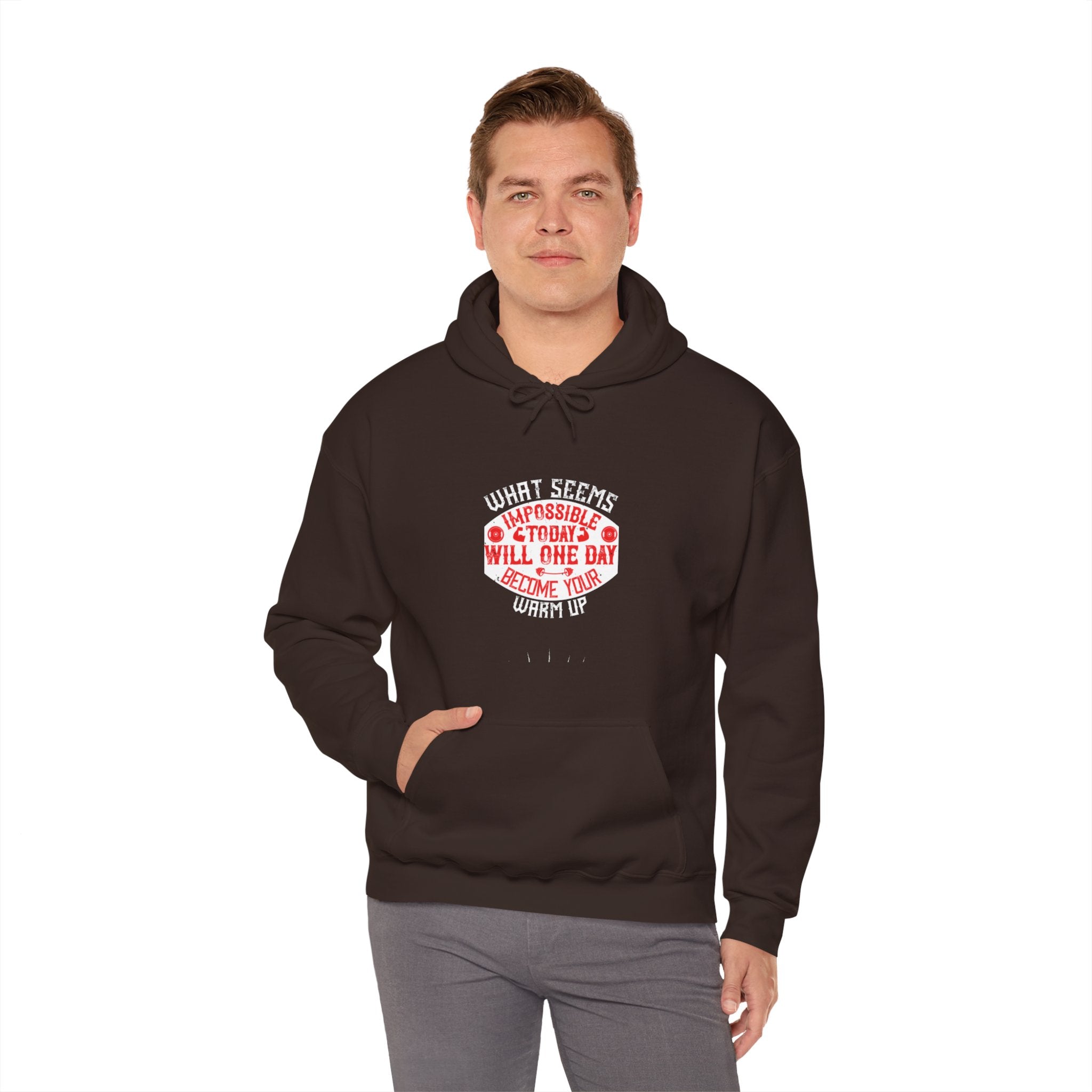 "What seems impossible today will one day become your warm-up" Unisex Heavy Blend™ Hooded Sweatshirt