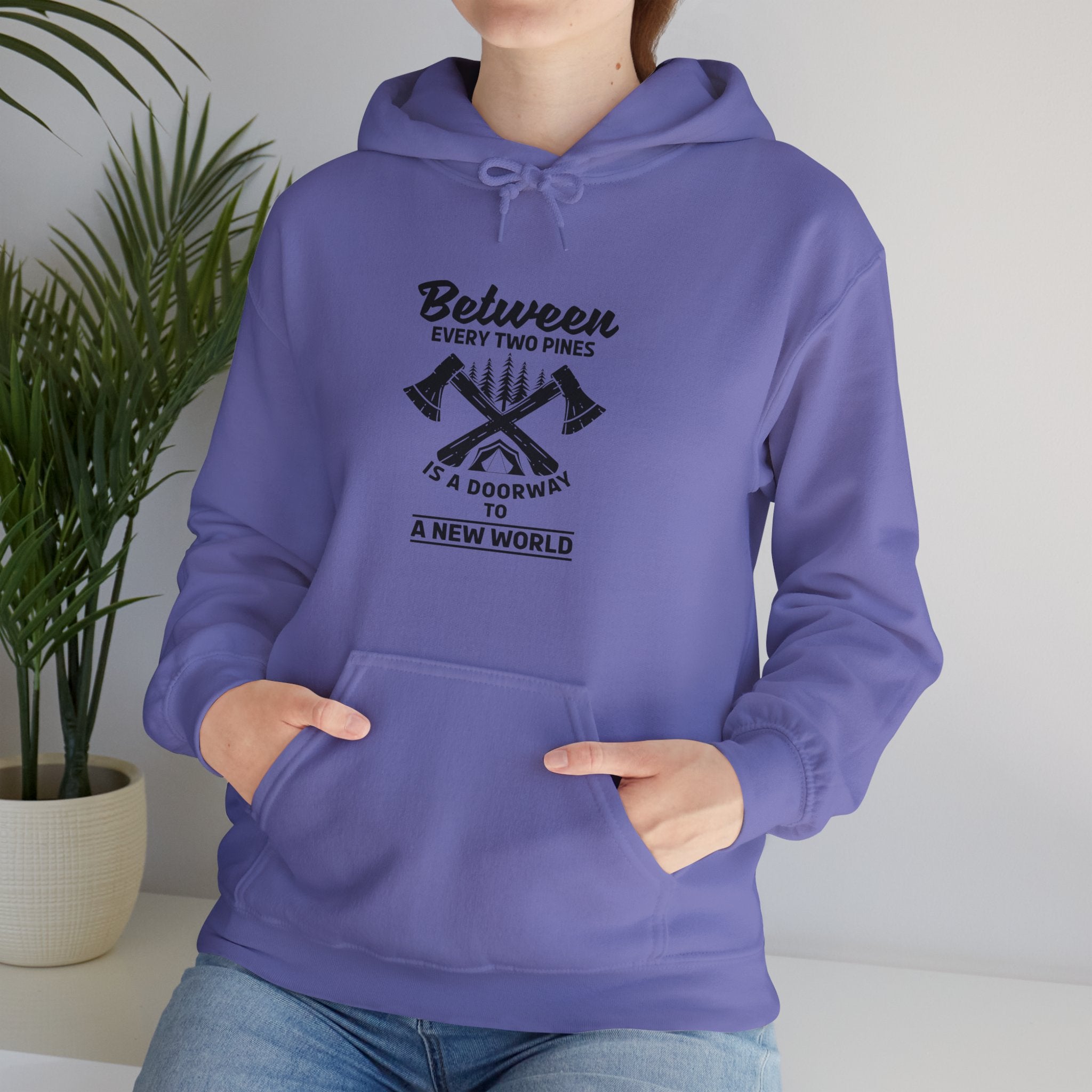 "Between Every Two Pines Is A Door To New World" Unisex Heavy Blend™ Hooded Sweatshirt