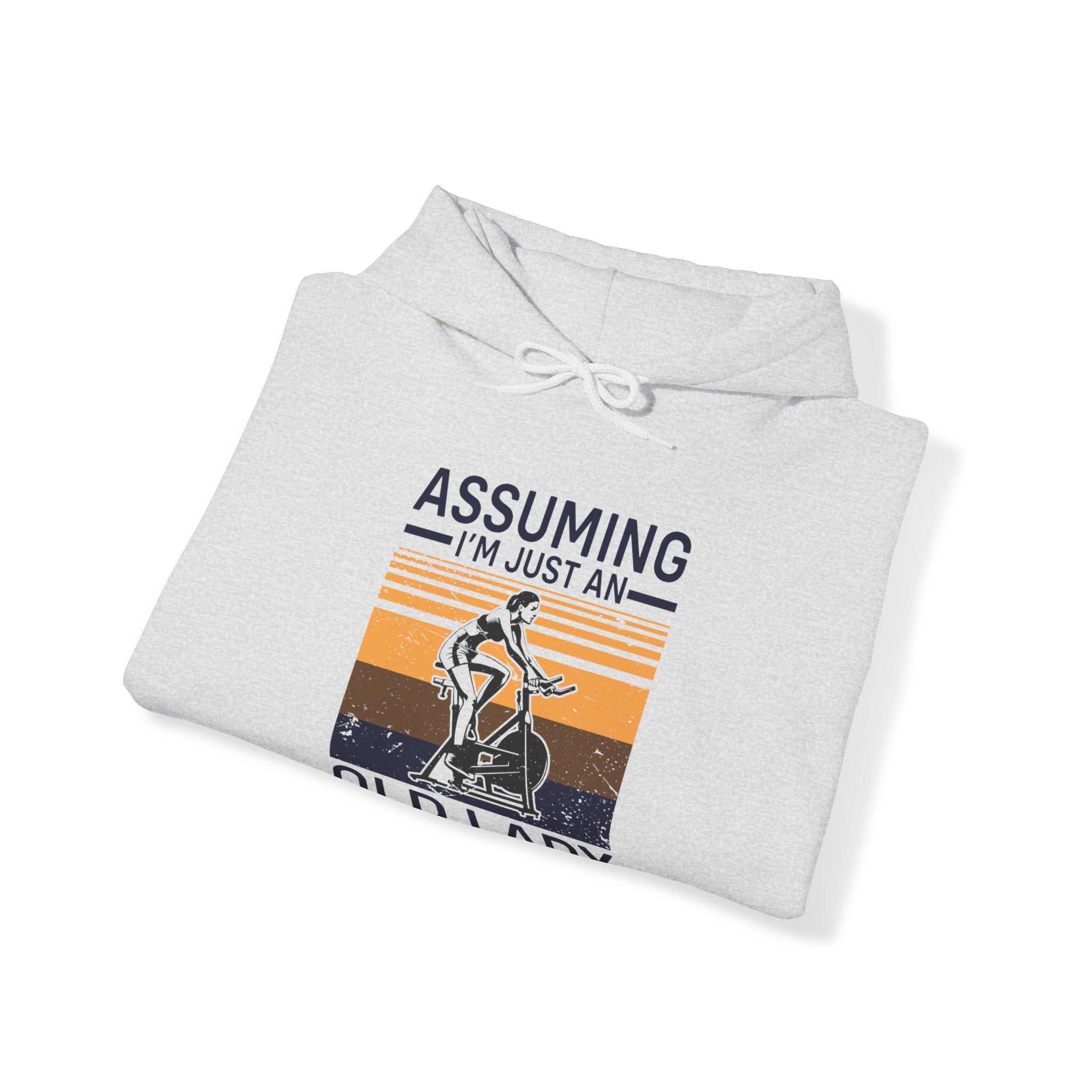 "Assuming I M Just An Old Lady Was Your First Mistake"  Unisex Heavy Blend™ Hooded Sweatshirt