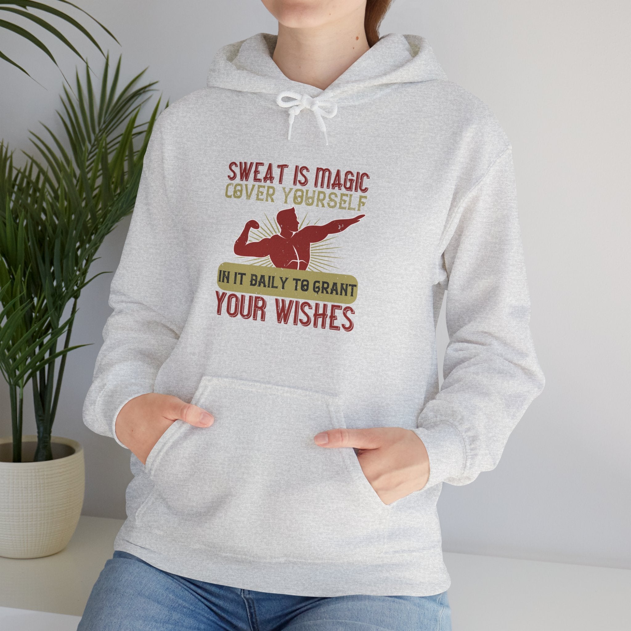 "Sweat is magic Cover yourself in it daily to grant your wishes"  Unisex Heavy Blend™ Hooded Sweatshirt