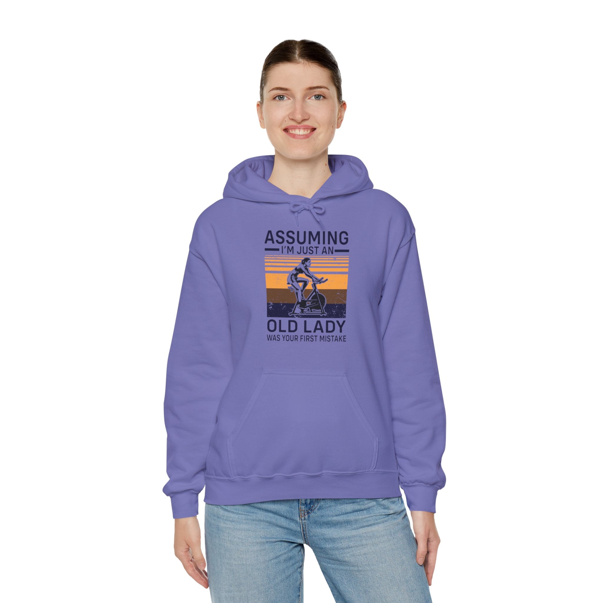 "Assuming I M Just An Old Lady Was Your First Mistake"  Unisex Heavy Blend™ Hooded Sweatshirt