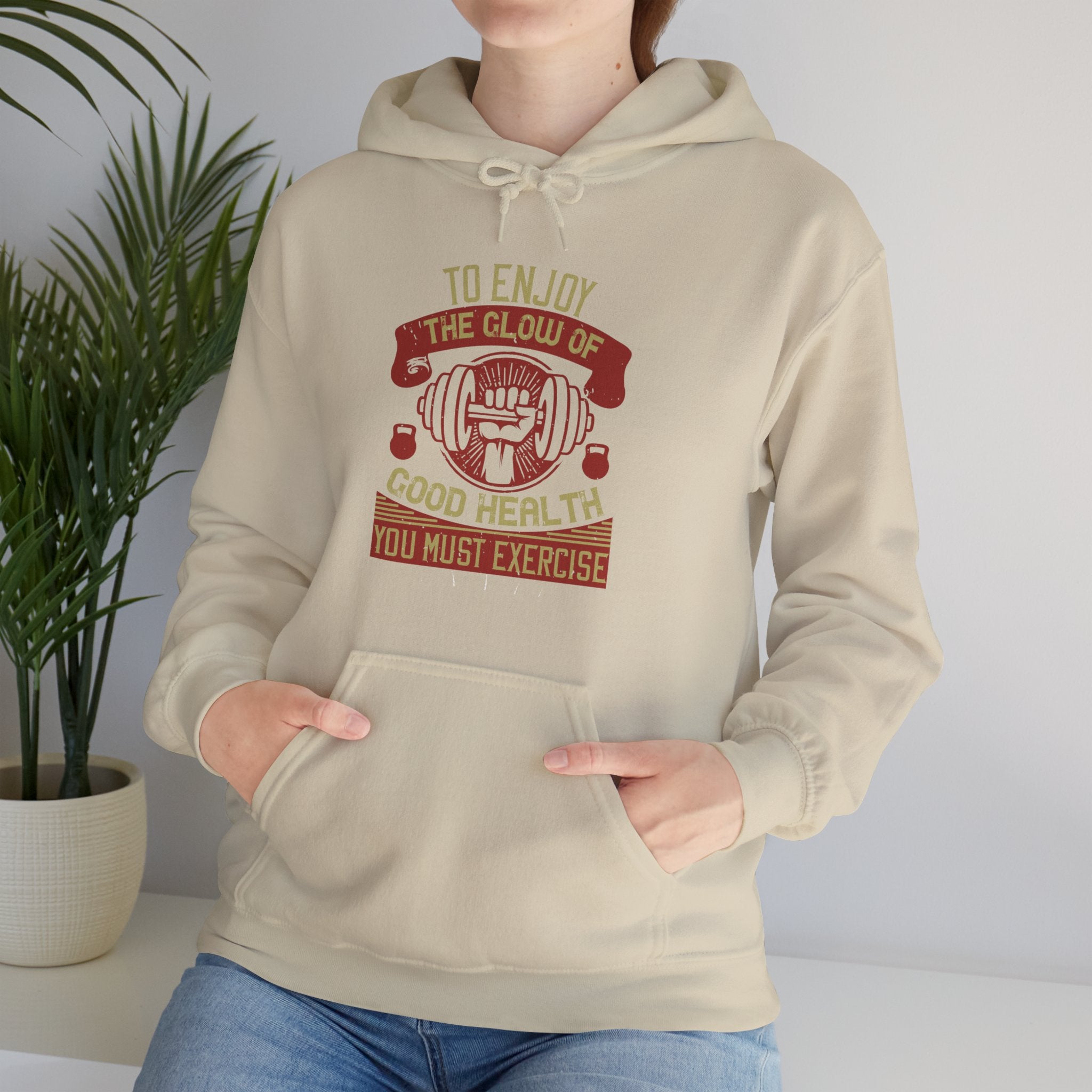 "To enjoy the glow of good health, you must exercise"  Unisex Heavy Blend™ Hooded Sweatshirt