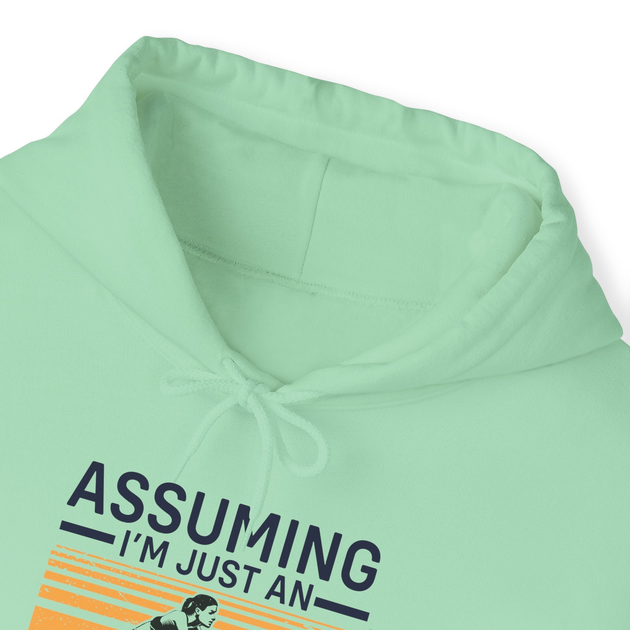 "Assuming I M Just An Old Lady Was Your First Mistake"  Unisex Heavy Blend™ Hooded Sweatshirt