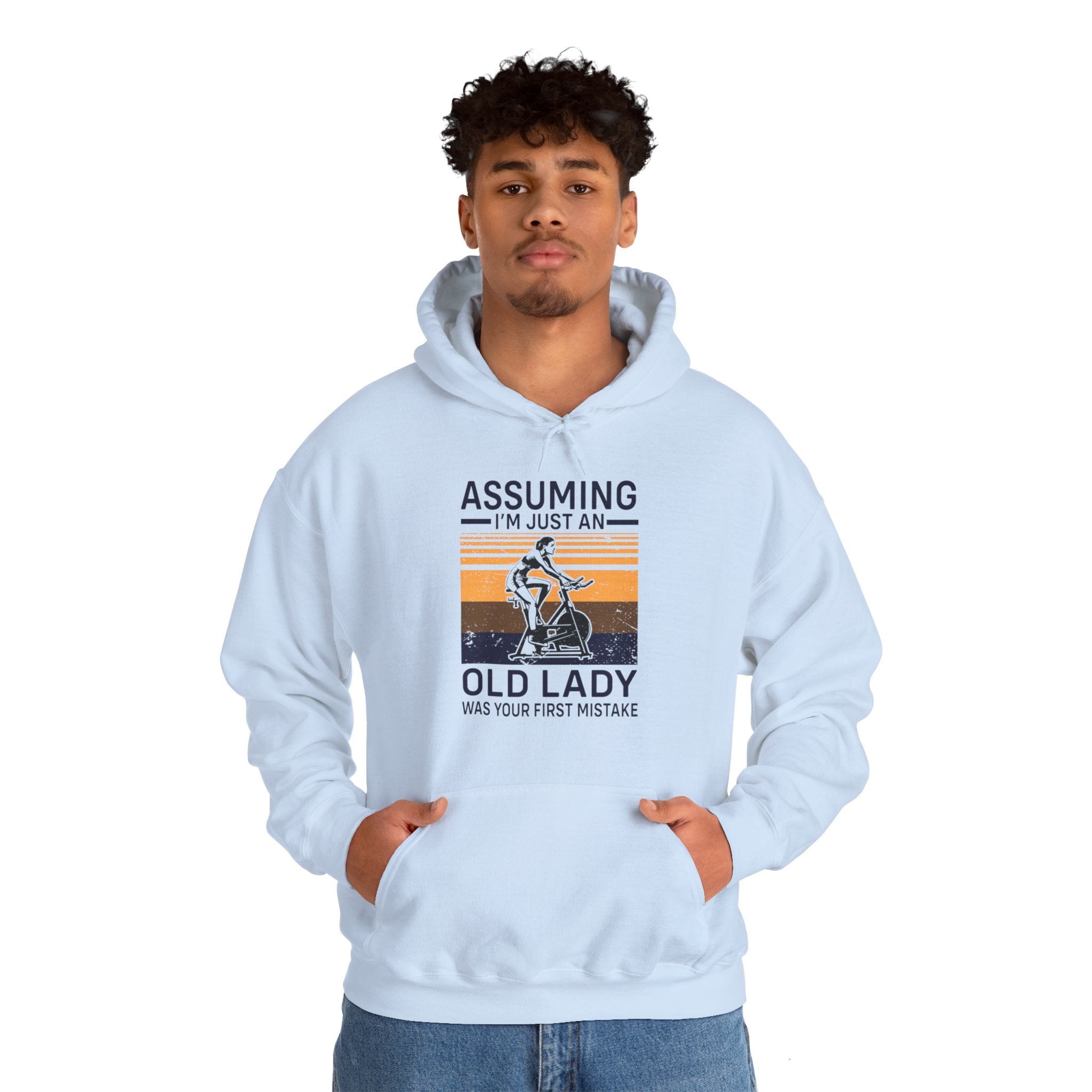 "Assuming I M Just An Old Lady Was Your First Mistake"  Unisex Heavy Blend™ Hooded Sweatshirt