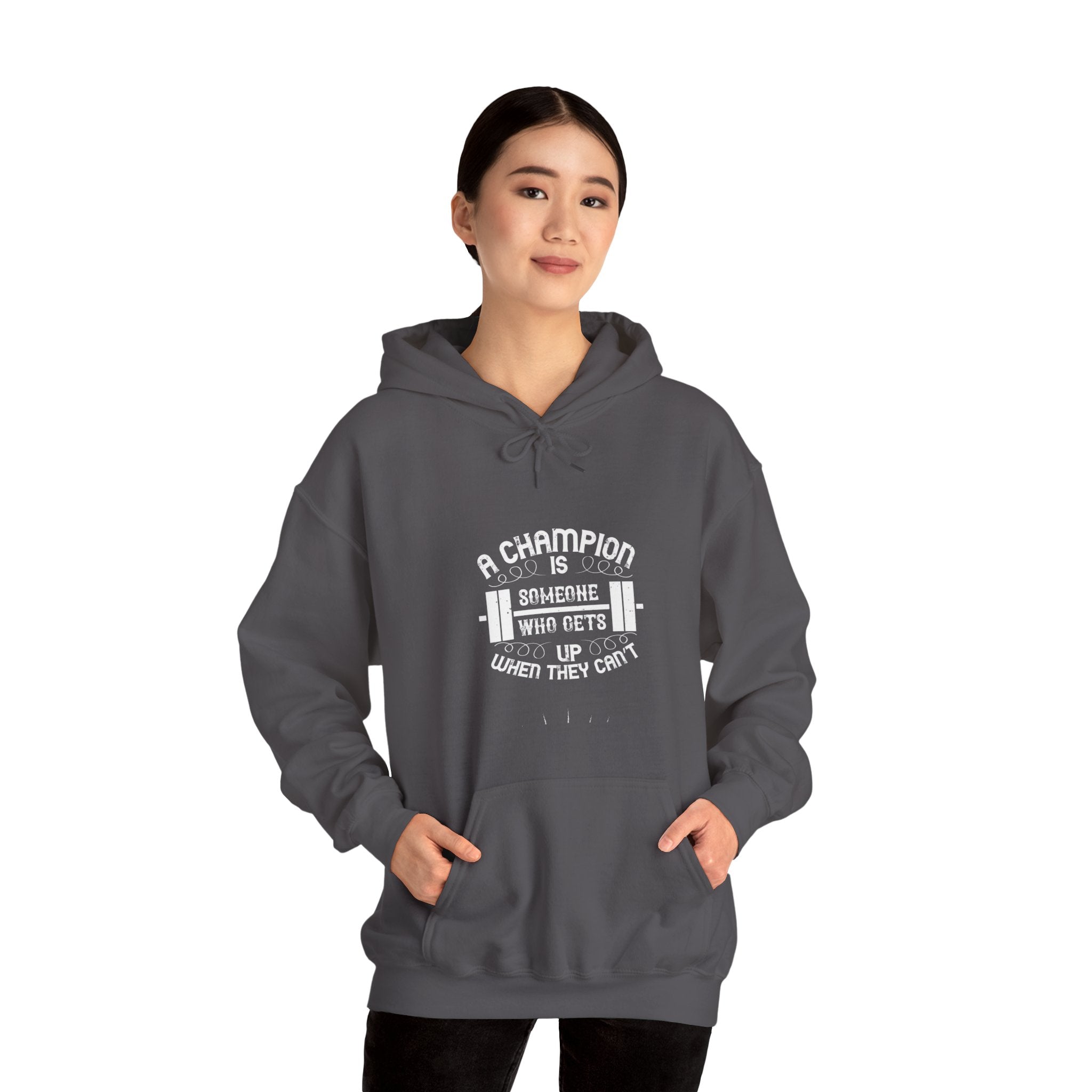 "A Champion Is Someone Who Gets Up When They Can't" Unisex Heavy Blend™ Hooded Sweatshirt