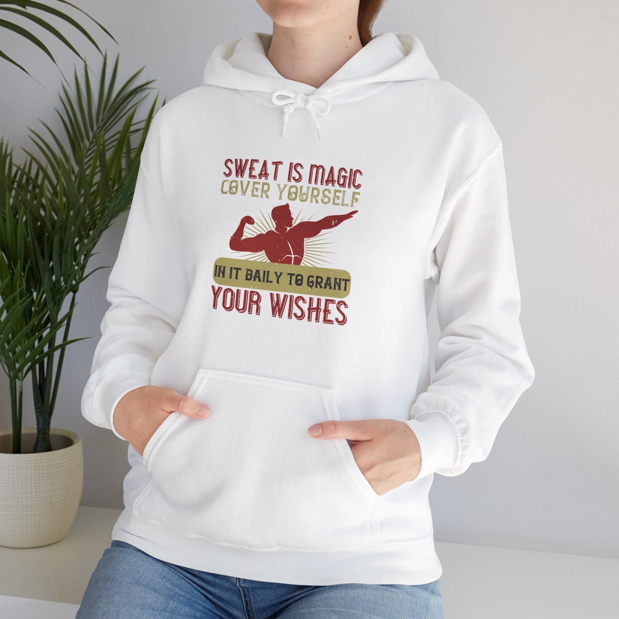 "Sweat is magic Cover yourself in it daily to grant your wishes"  Unisex Heavy Blend™ Hooded Sweatshirt