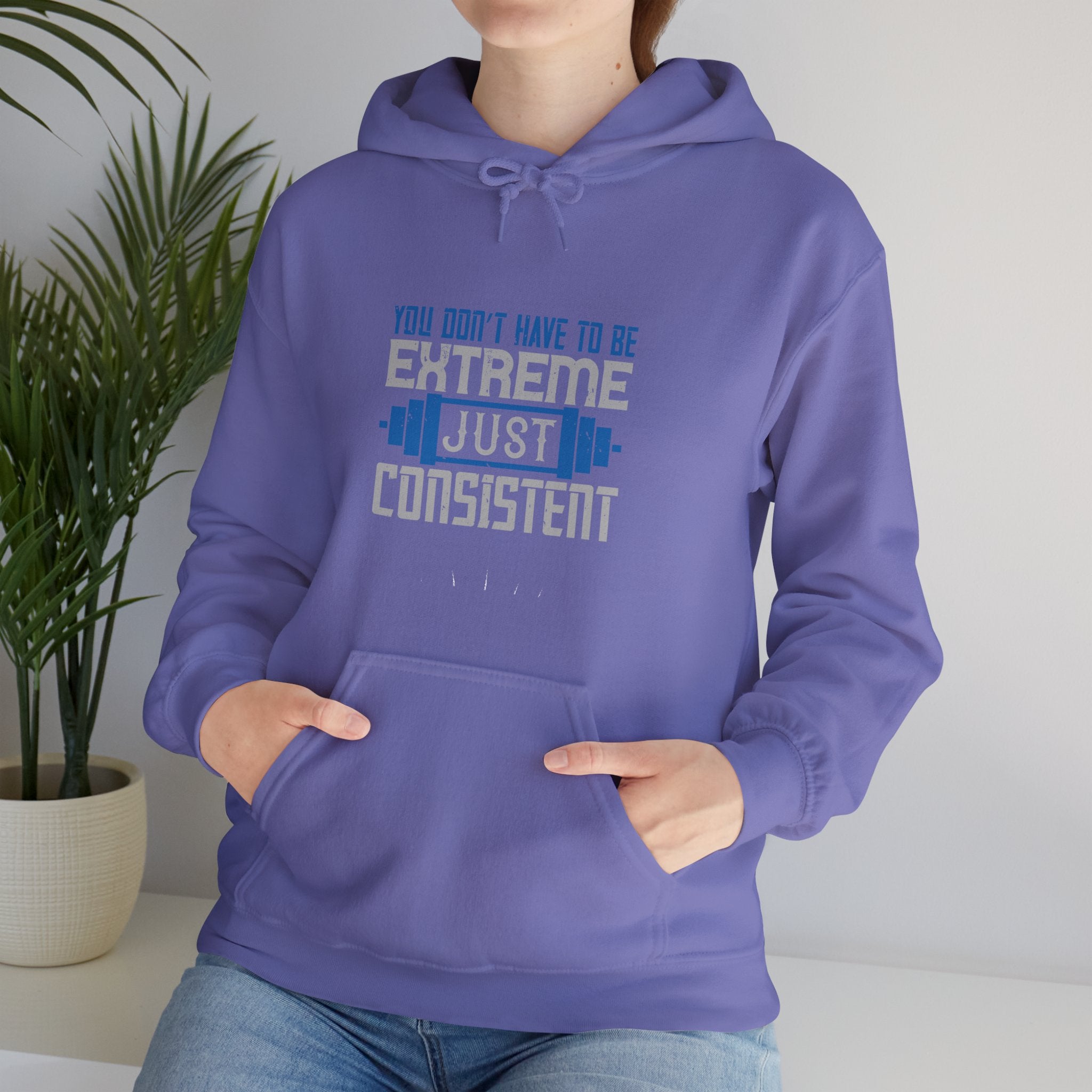 "You don’t have to be extreme, just consistent" Unisex Heavy Blend™ Hooded Sweatshirt