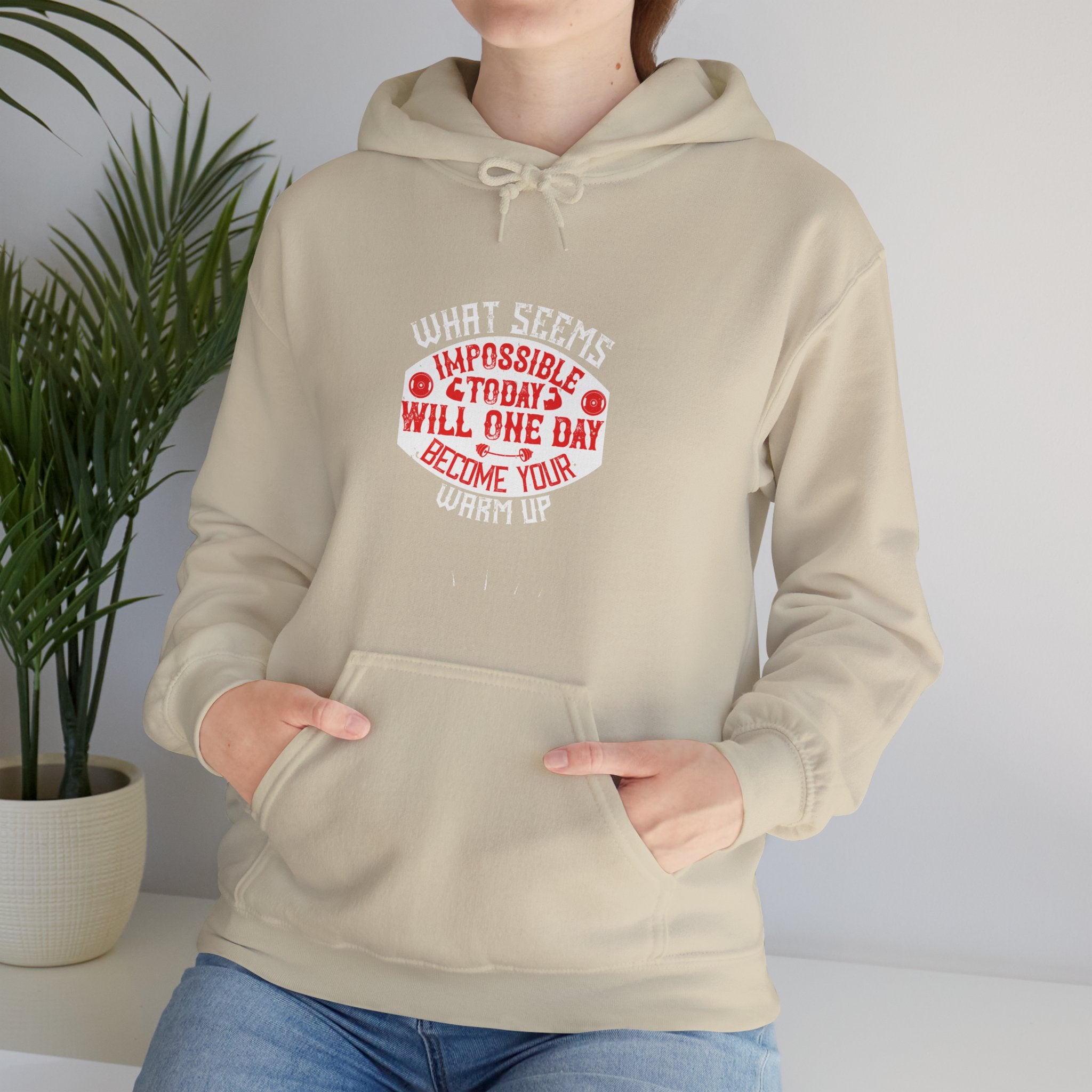 "What seems impossible today will one day become your warm-up" Unisex Heavy Blend™ Hooded Sweatshirt