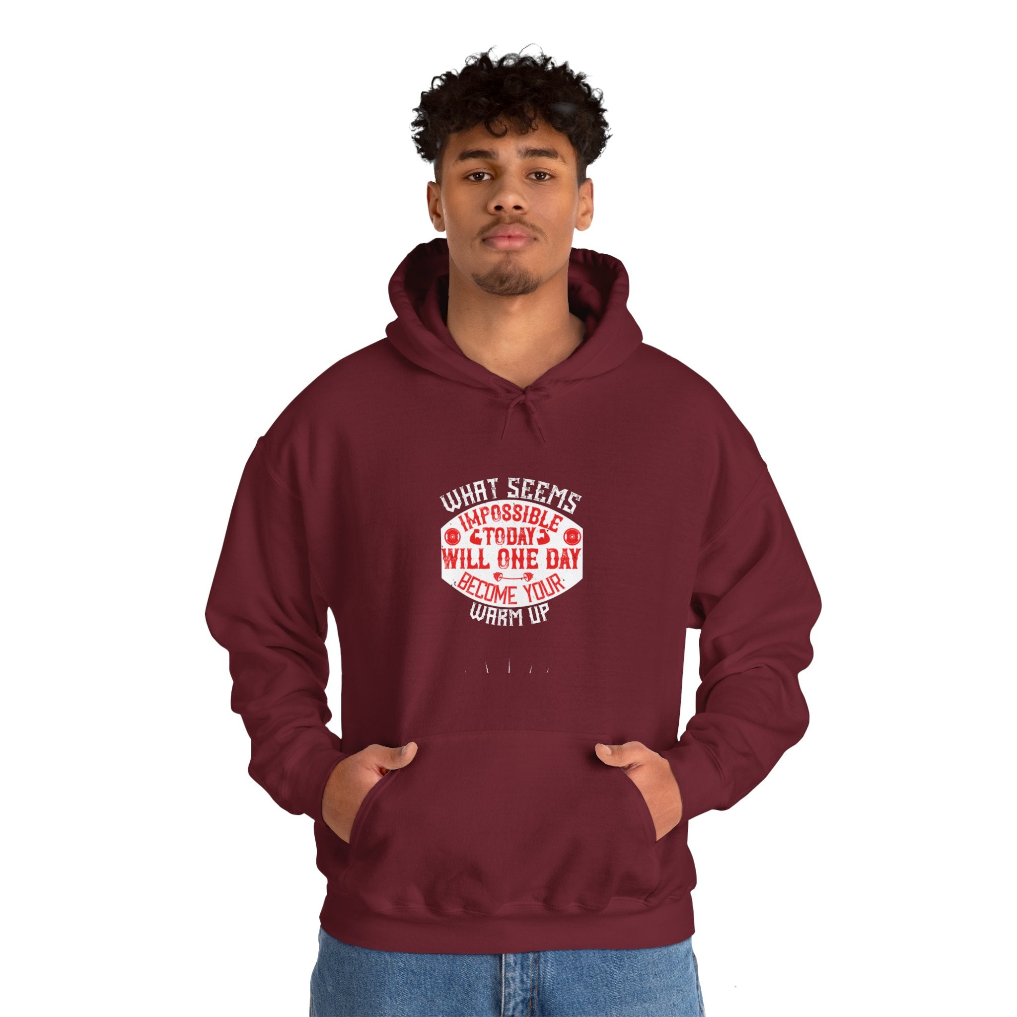 "What seems impossible today will one day become your warm-up" Unisex Heavy Blend™ Hooded Sweatshirt