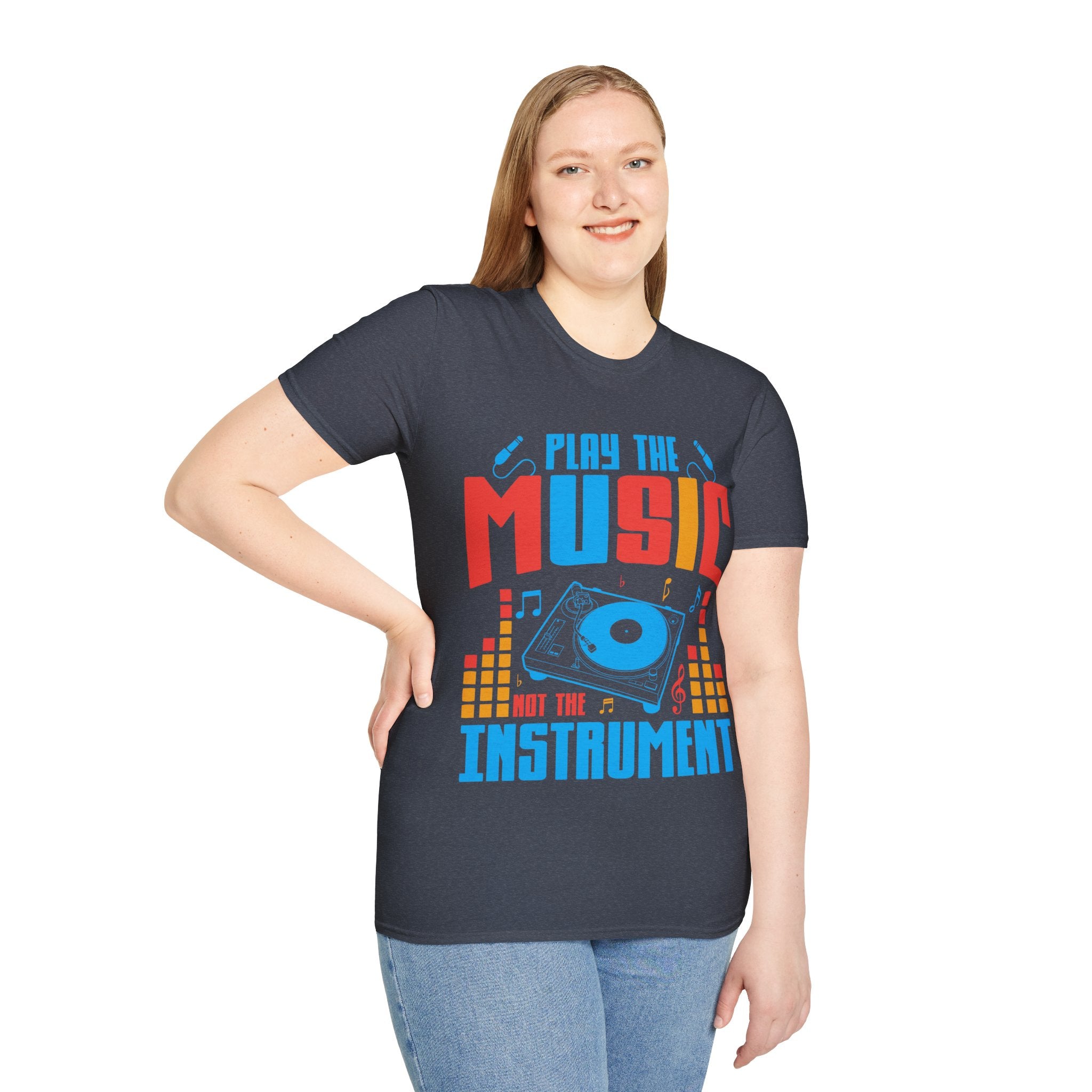 "Play The Music Not The Instrument"  Unisex Soft style T-Shirt