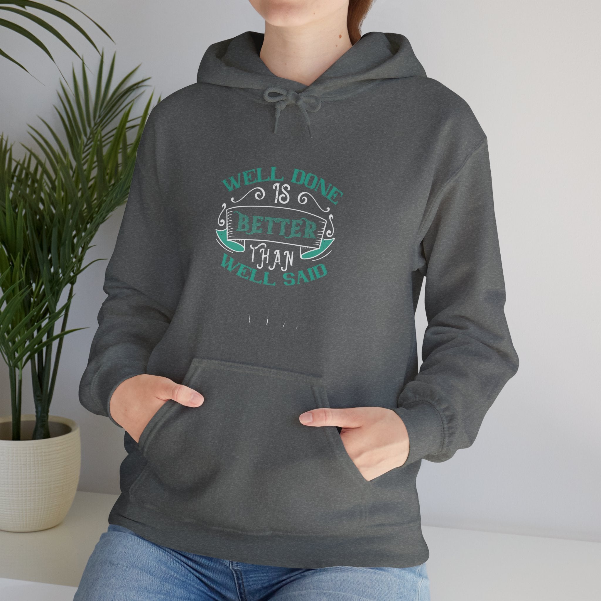 "Well done is better than well said"  Unisex Heavy Blend™ Hooded Sweatshirt