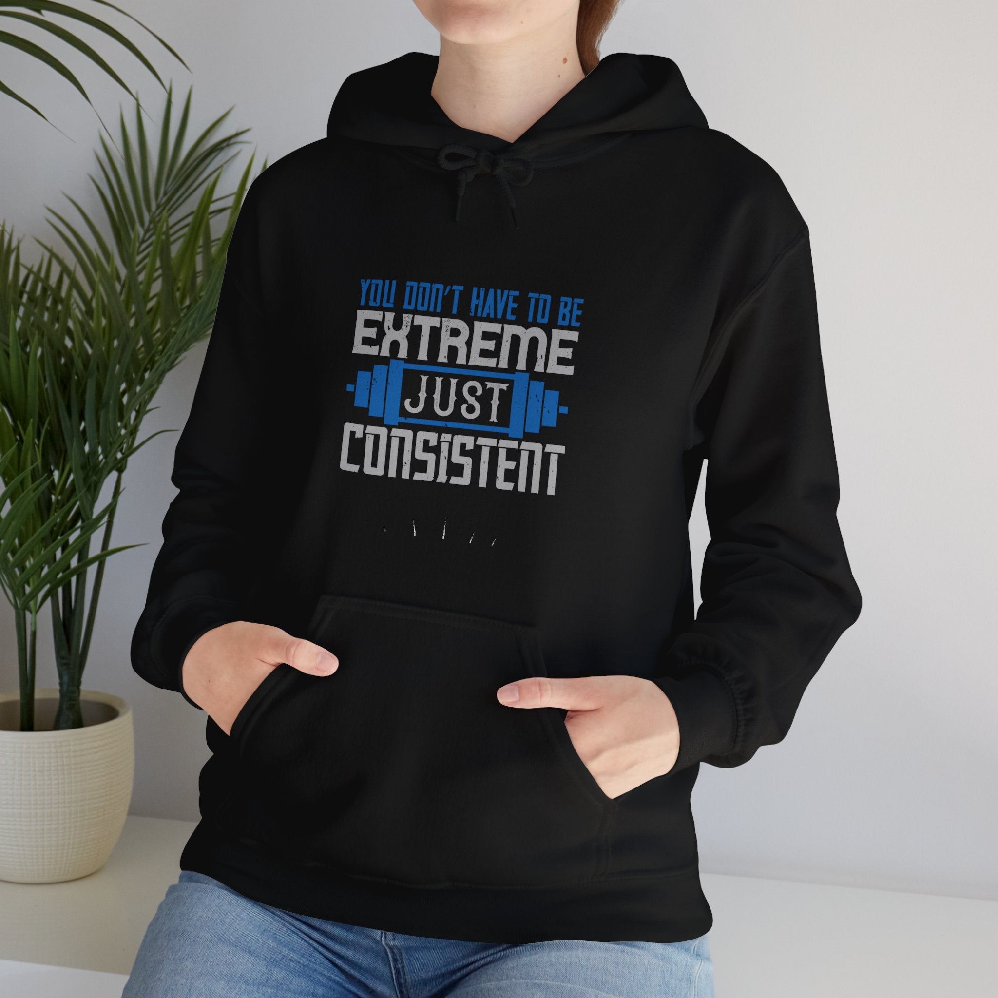 "You don’t have to be extreme, just consistent" Unisex Heavy Blend™ Hooded Sweatshirt