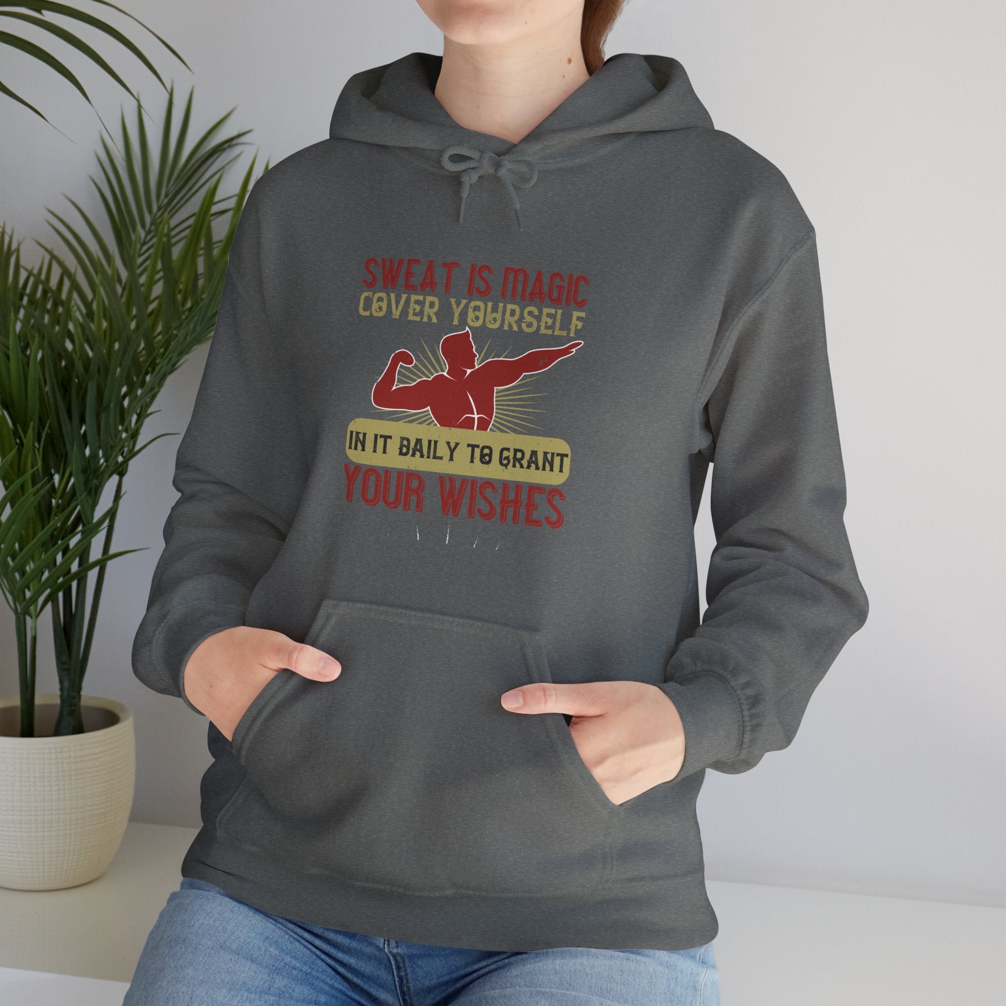 "Sweat is magic Cover yourself in it daily to grant your wishes"  Unisex Heavy Blend™ Hooded Sweatshirt