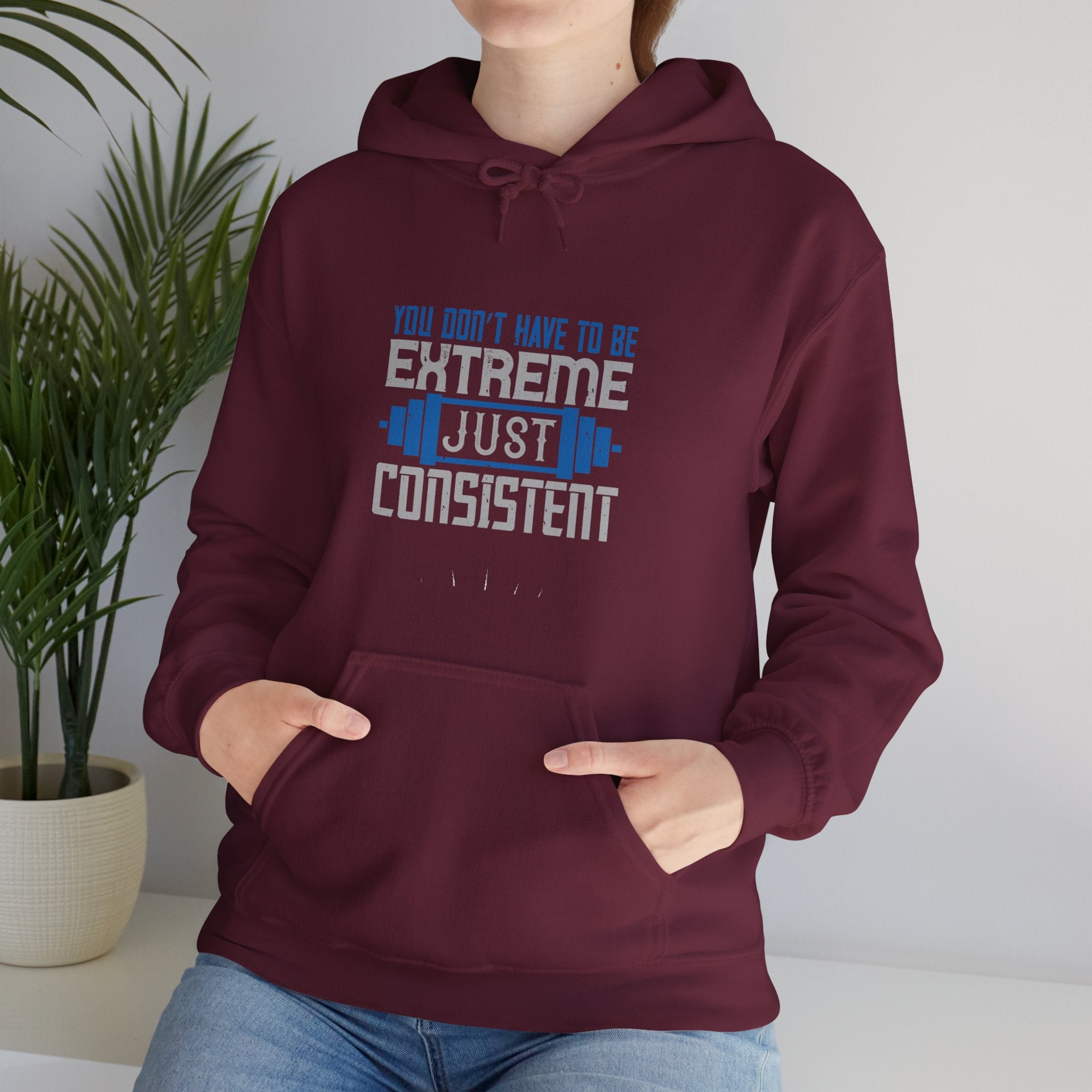 "You don’t have to be extreme, just consistent" Unisex Heavy Blend™ Hooded Sweatshirt