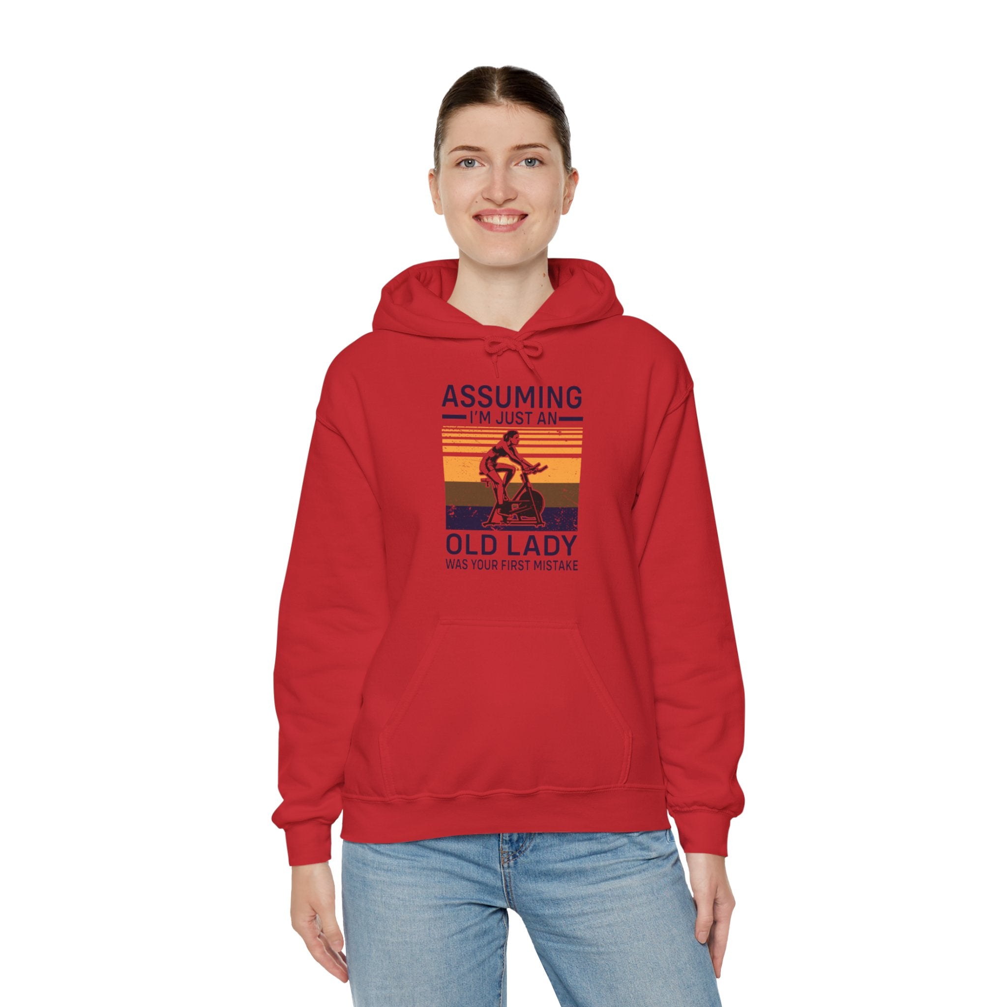 "Assuming I M Just An Old Lady Was Your First Mistake"  Unisex Heavy Blend™ Hooded Sweatshirt