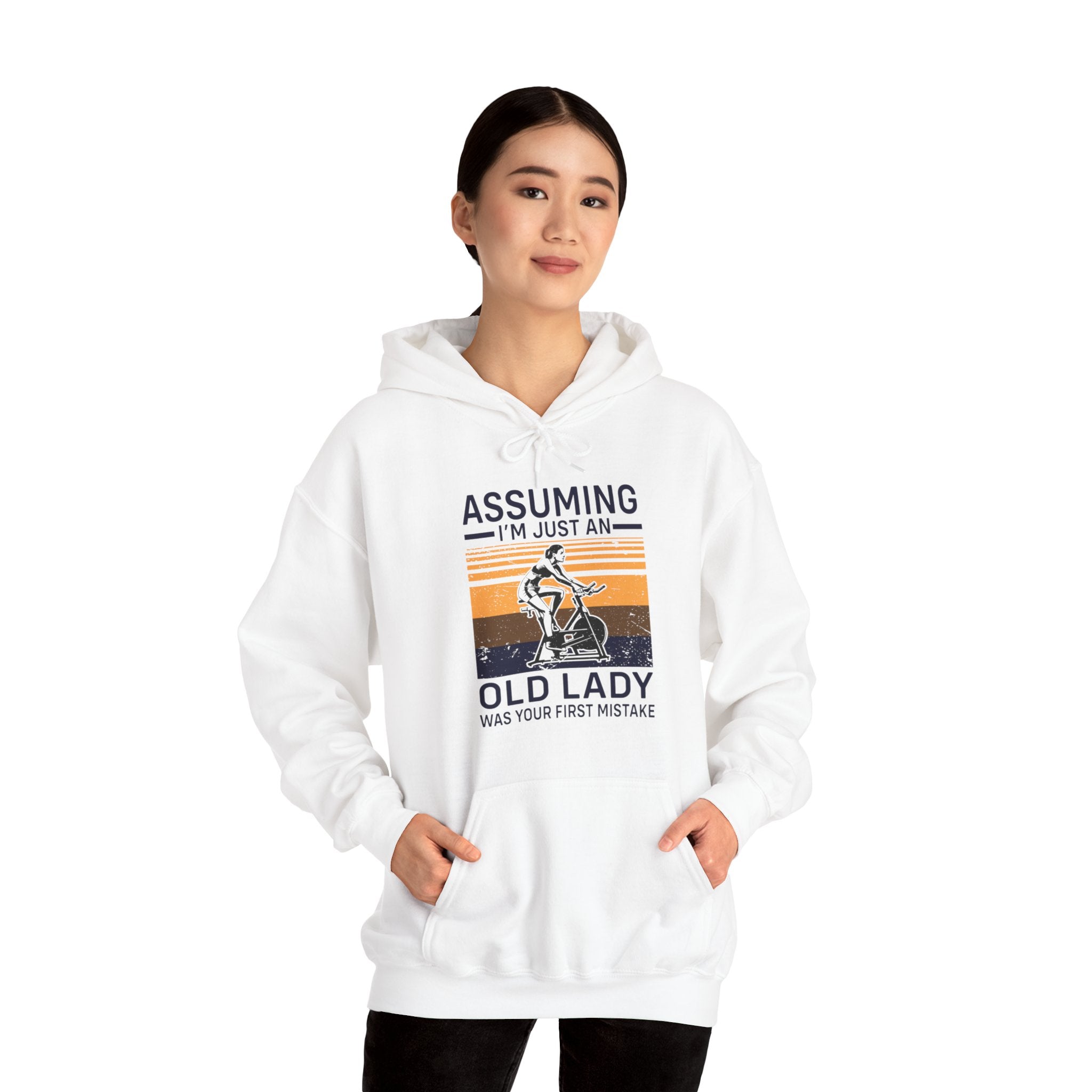 "Assuming I M Just An Old Lady Was Your First Mistake"  Unisex Heavy Blend™ Hooded Sweatshirt