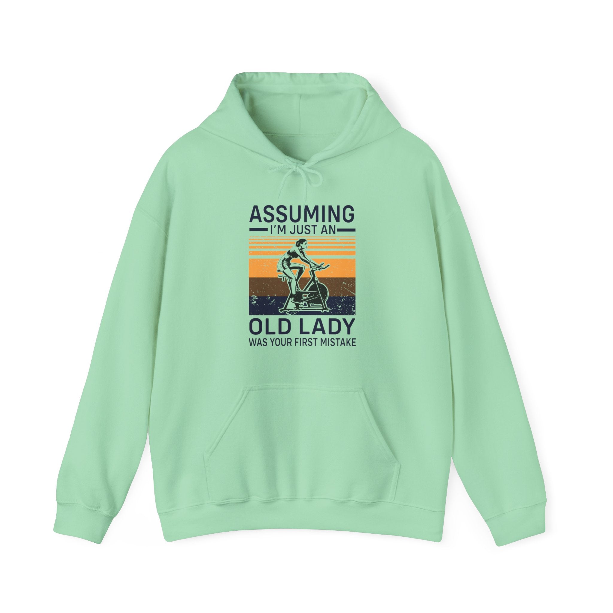 "Assuming I M Just An Old Lady Was Your First Mistake"  Unisex Heavy Blend™ Hooded Sweatshirt