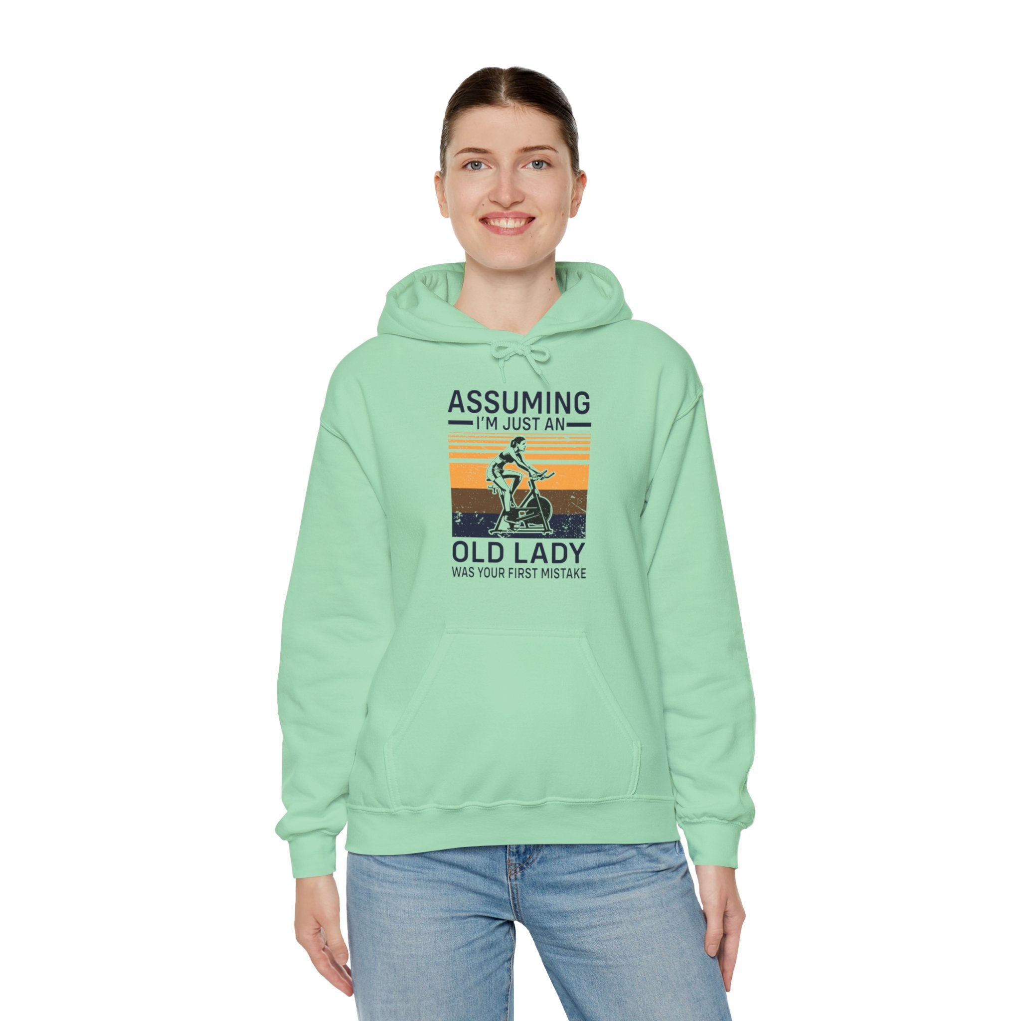 "Assuming I M Just An Old Lady Was Your First Mistake"  Unisex Heavy Blend™ Hooded Sweatshirt