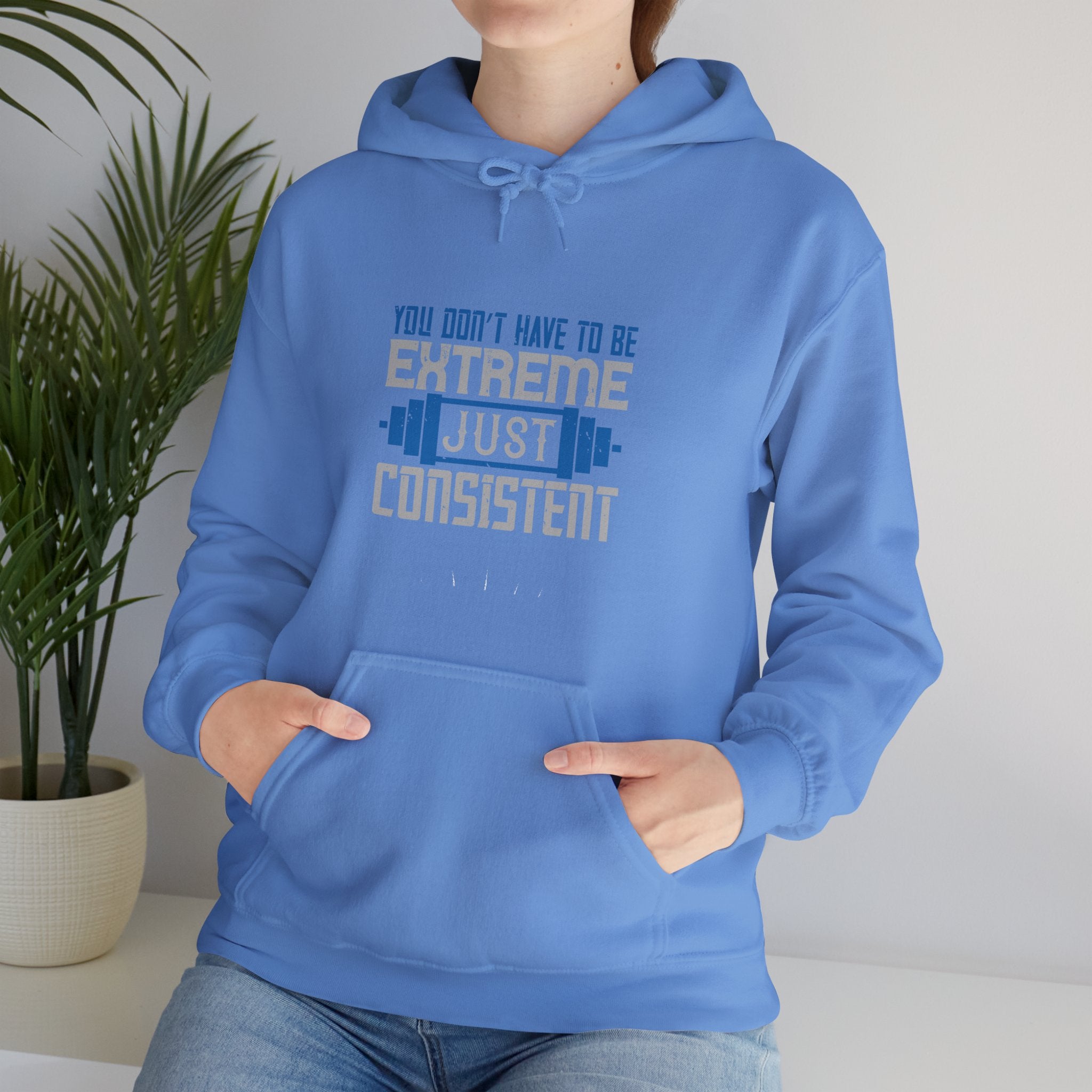 "You don’t have to be extreme, just consistent" Unisex Heavy Blend™ Hooded Sweatshirt