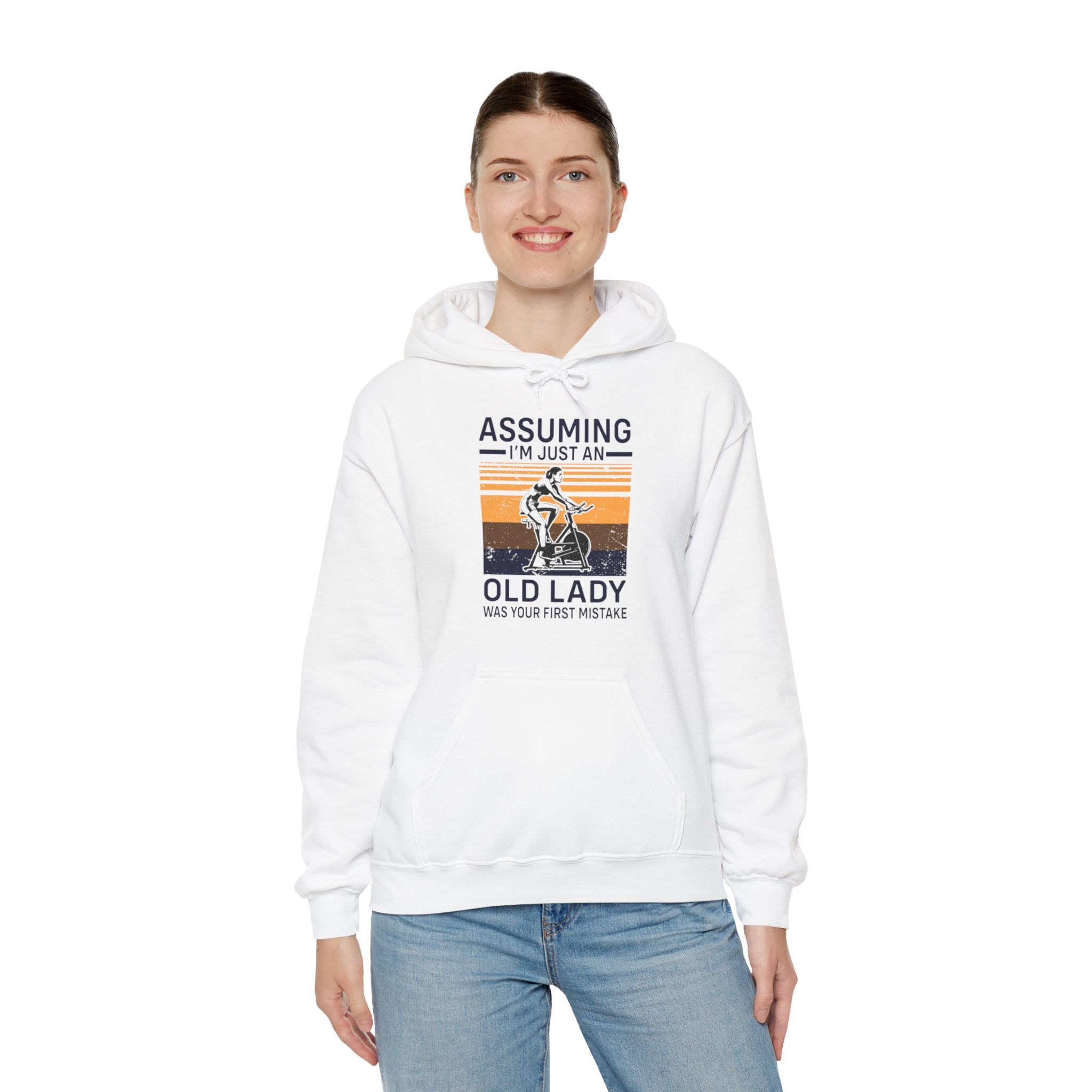 "Assuming I M Just An Old Lady Was Your First Mistake"  Unisex Heavy Blend™ Hooded Sweatshirt