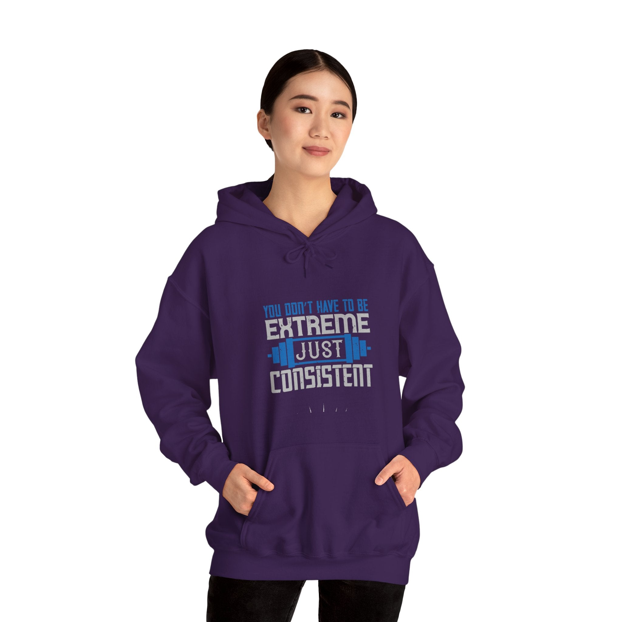 "You don’t have to be extreme, just consistent" Unisex Heavy Blend™ Hooded Sweatshirt