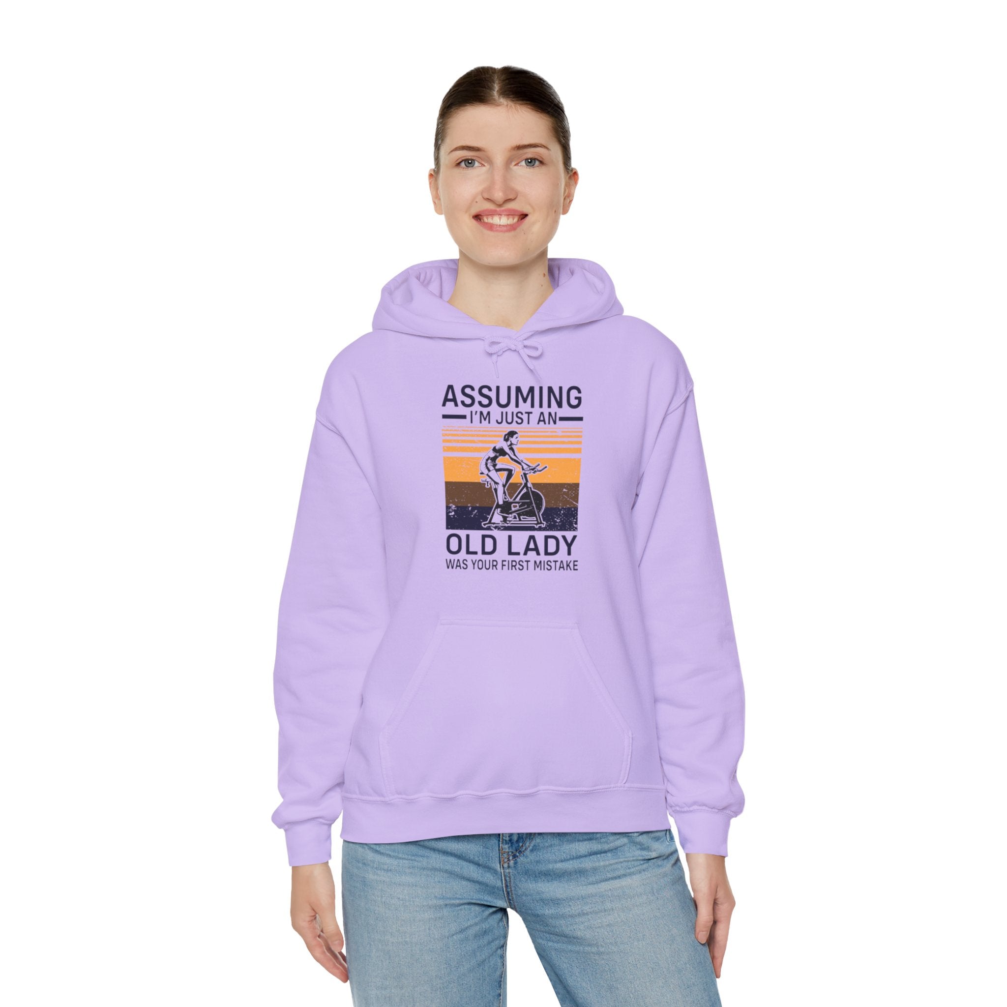 "Assuming I M Just An Old Lady Was Your First Mistake"  Unisex Heavy Blend™ Hooded Sweatshirt