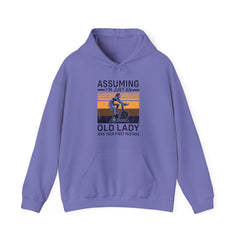 "Assuming I M Just An Old Lady Was Your First Mistake"  Unisex Heavy Blend™ Hooded Sweatshirt