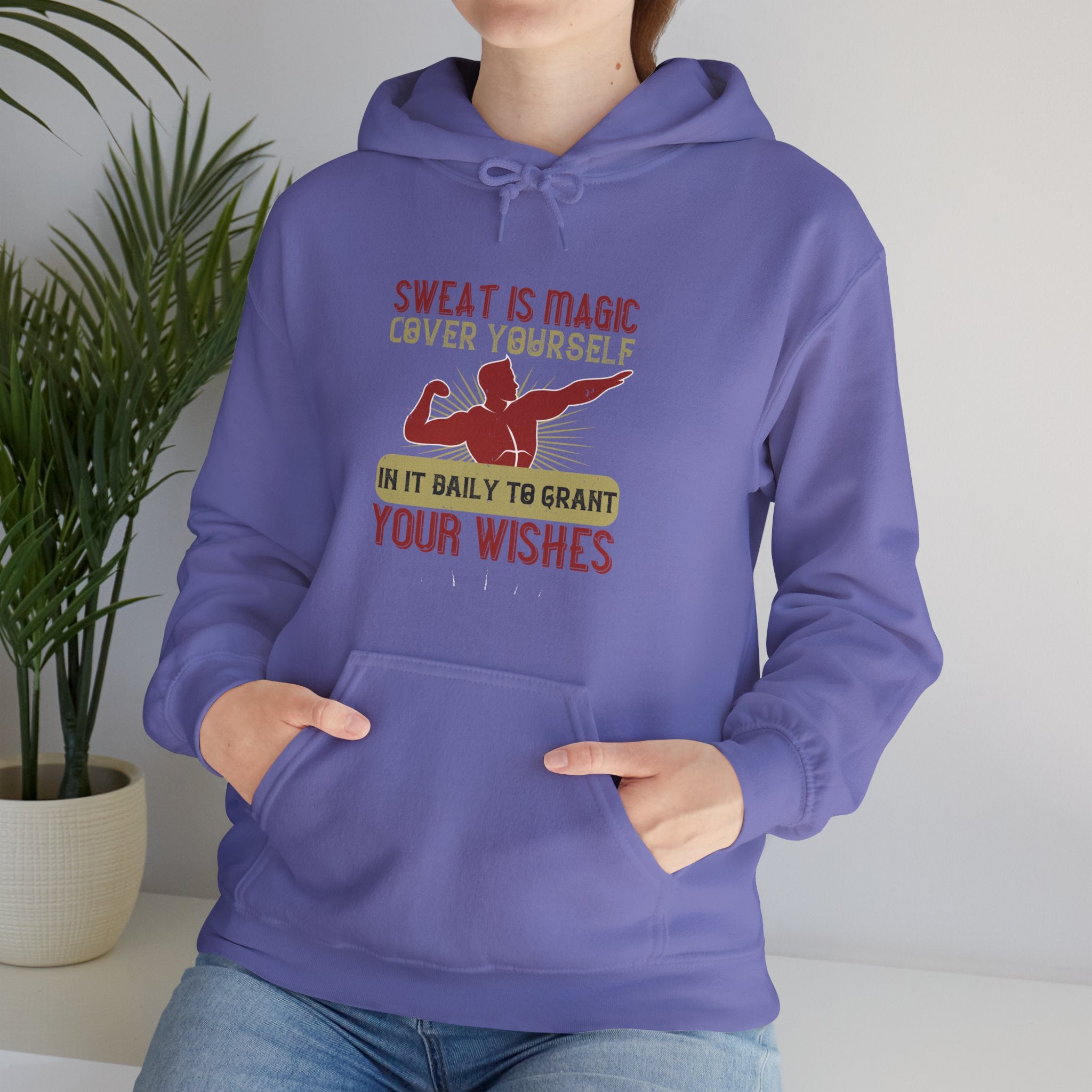 "Sweat is magic Cover yourself in it daily to grant your wishes"  Unisex Heavy Blend™ Hooded Sweatshirt