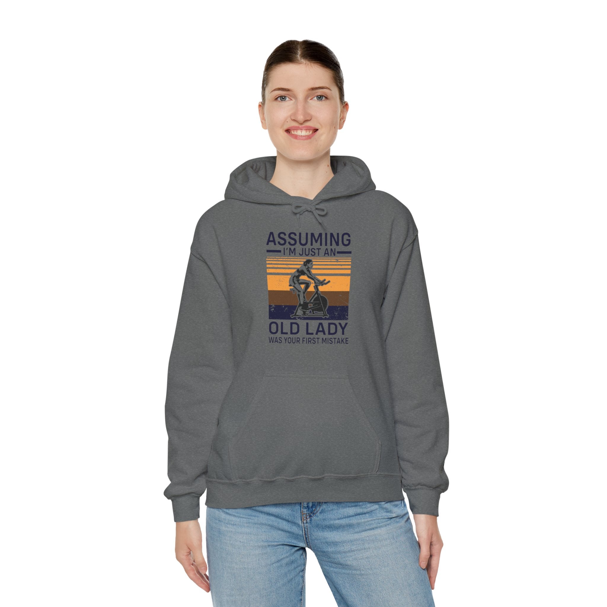 "Assuming I M Just An Old Lady Was Your First Mistake"  Unisex Heavy Blend™ Hooded Sweatshirt