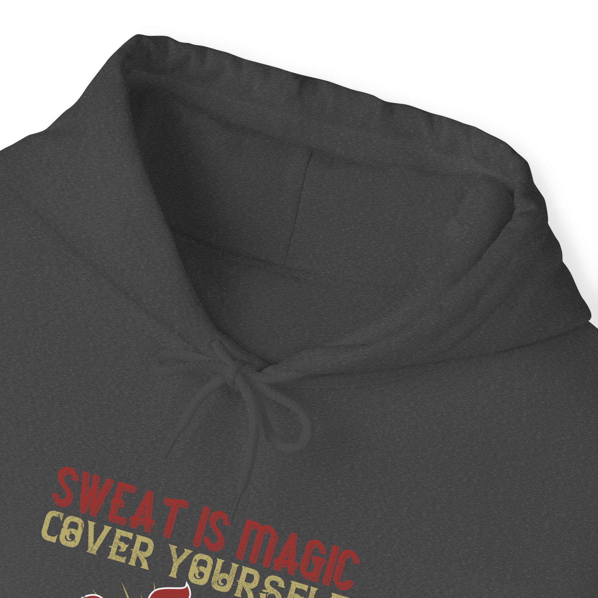 "Sweat is magic Cover yourself in it daily to grant your wishes"  Unisex Heavy Blend™ Hooded Sweatshirt