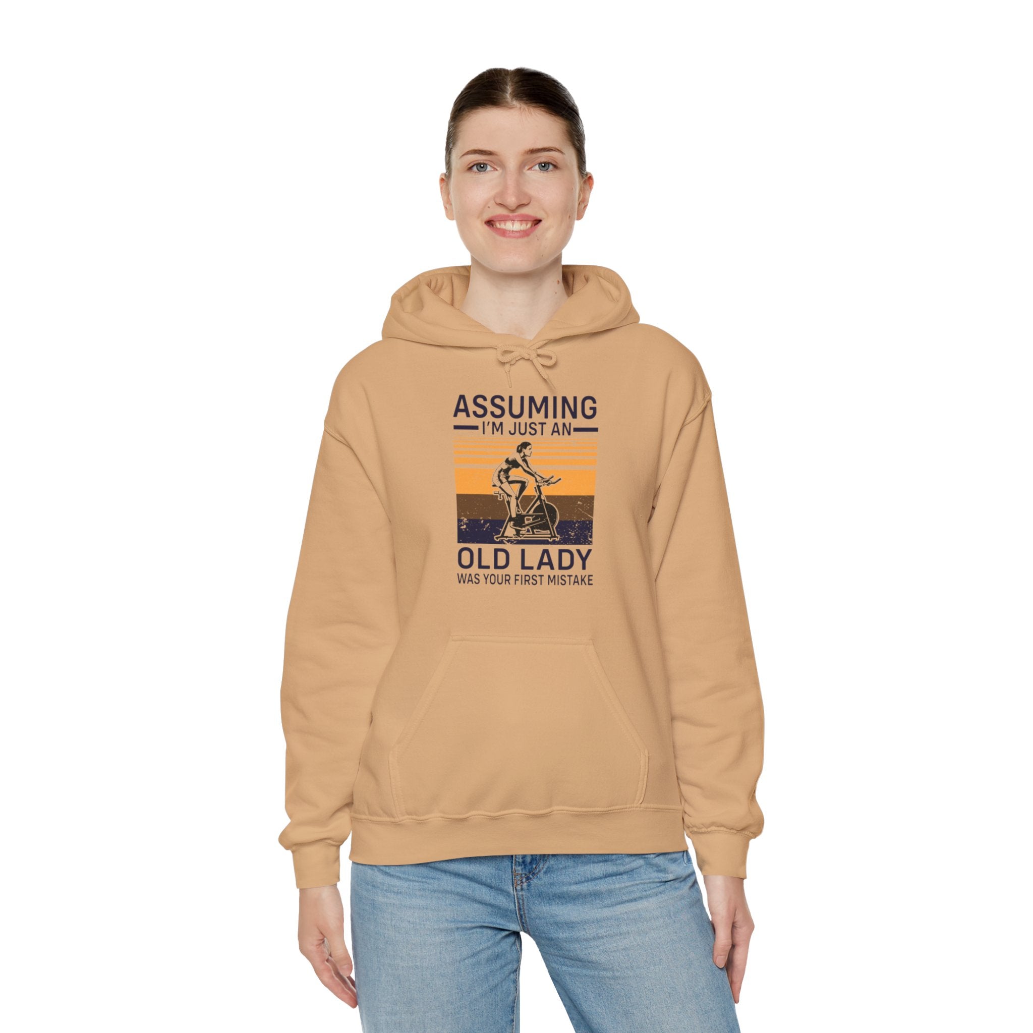 "Assuming I M Just An Old Lady Was Your First Mistake"  Unisex Heavy Blend™ Hooded Sweatshirt