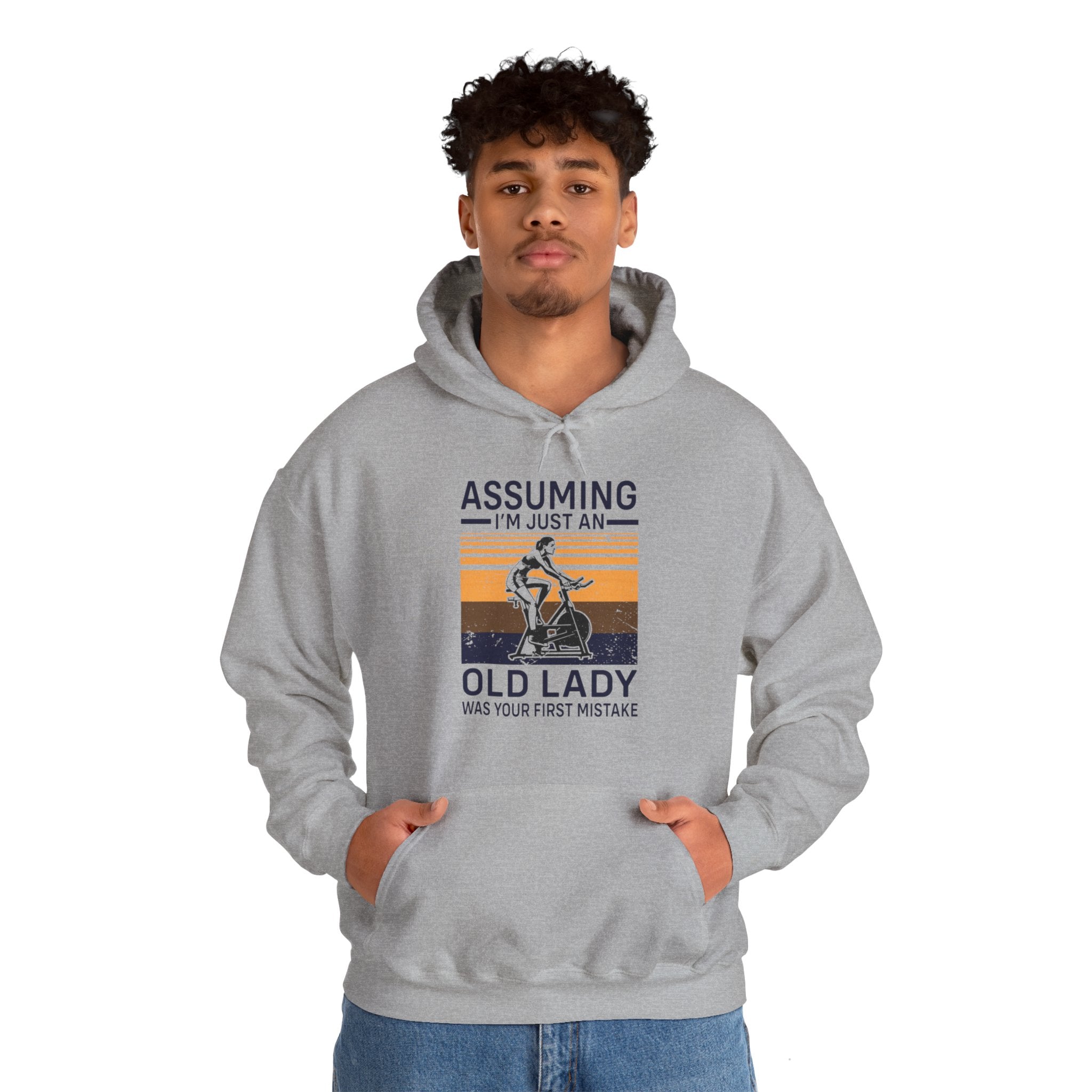 "Assuming I M Just An Old Lady Was Your First Mistake"  Unisex Heavy Blend™ Hooded Sweatshirt