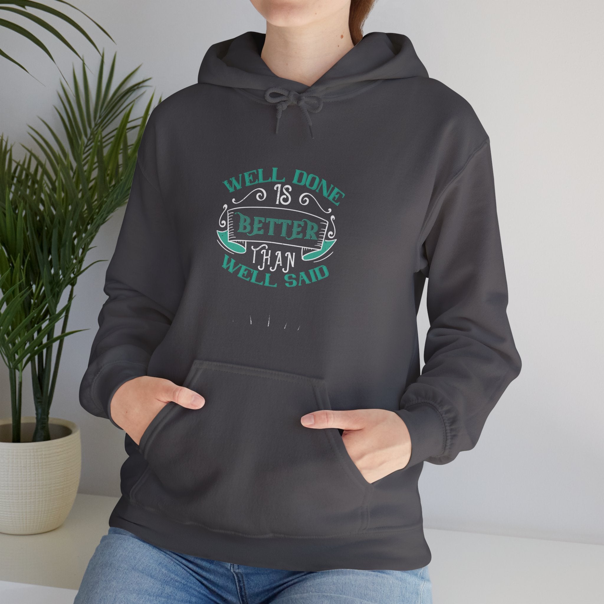 "Well done is better than well said"  Unisex Heavy Blend™ Hooded Sweatshirt