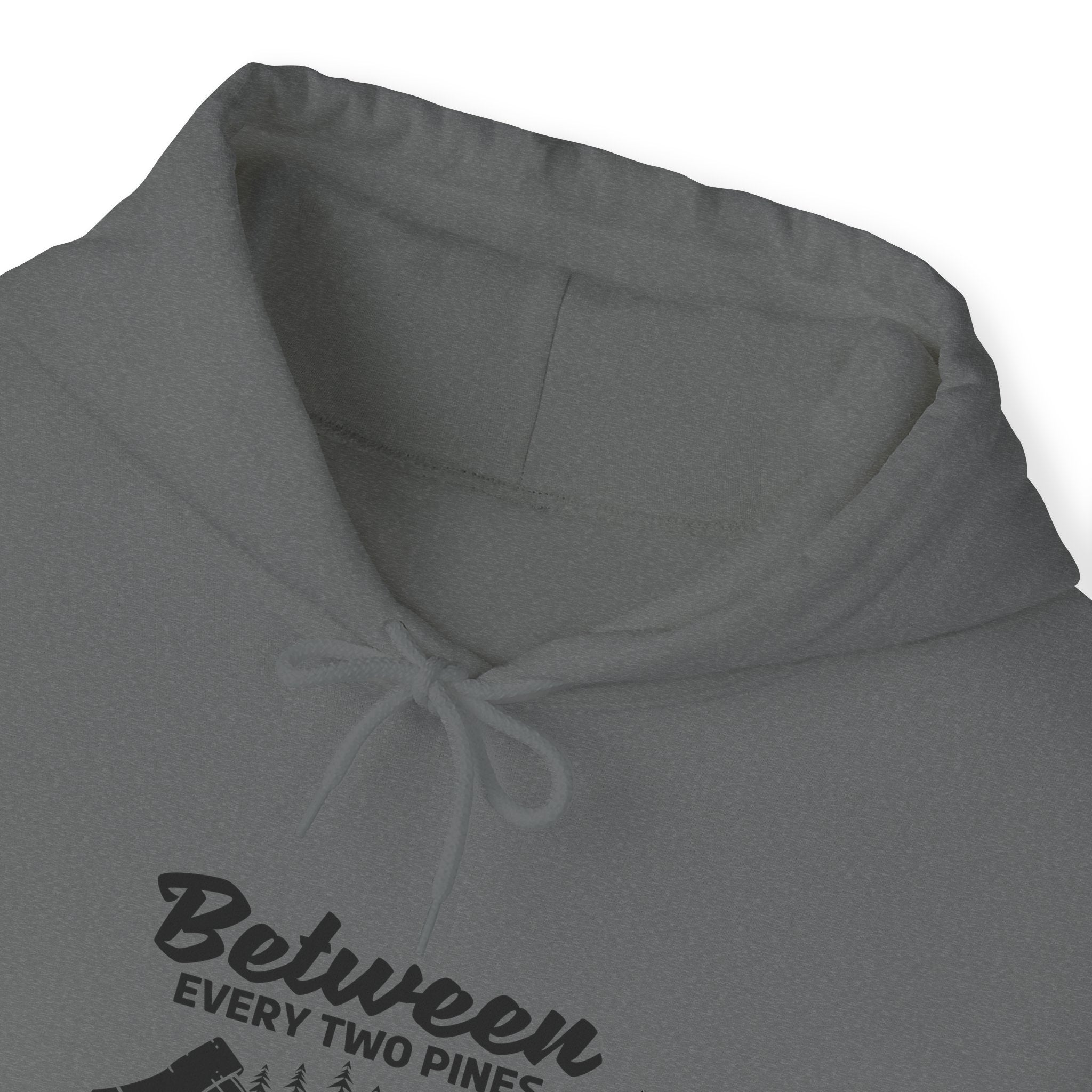 "Between Every Two Pines Is A Door To New World" Unisex Heavy Blend™ Hooded Sweatshirt