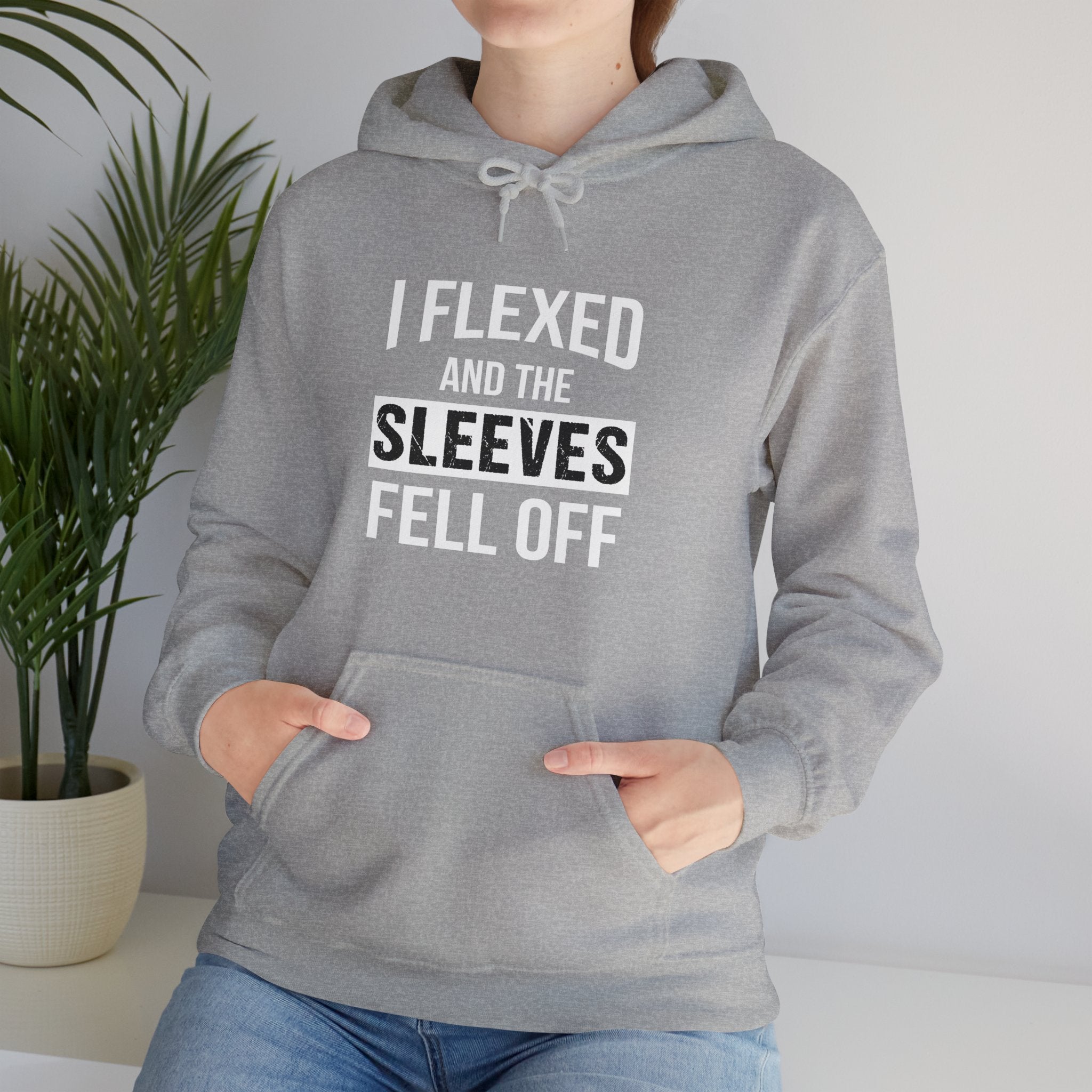 "I Flexed And The Sleeves Fell Off" Unisex Heavy Blend™ Hooded Sweatshirt