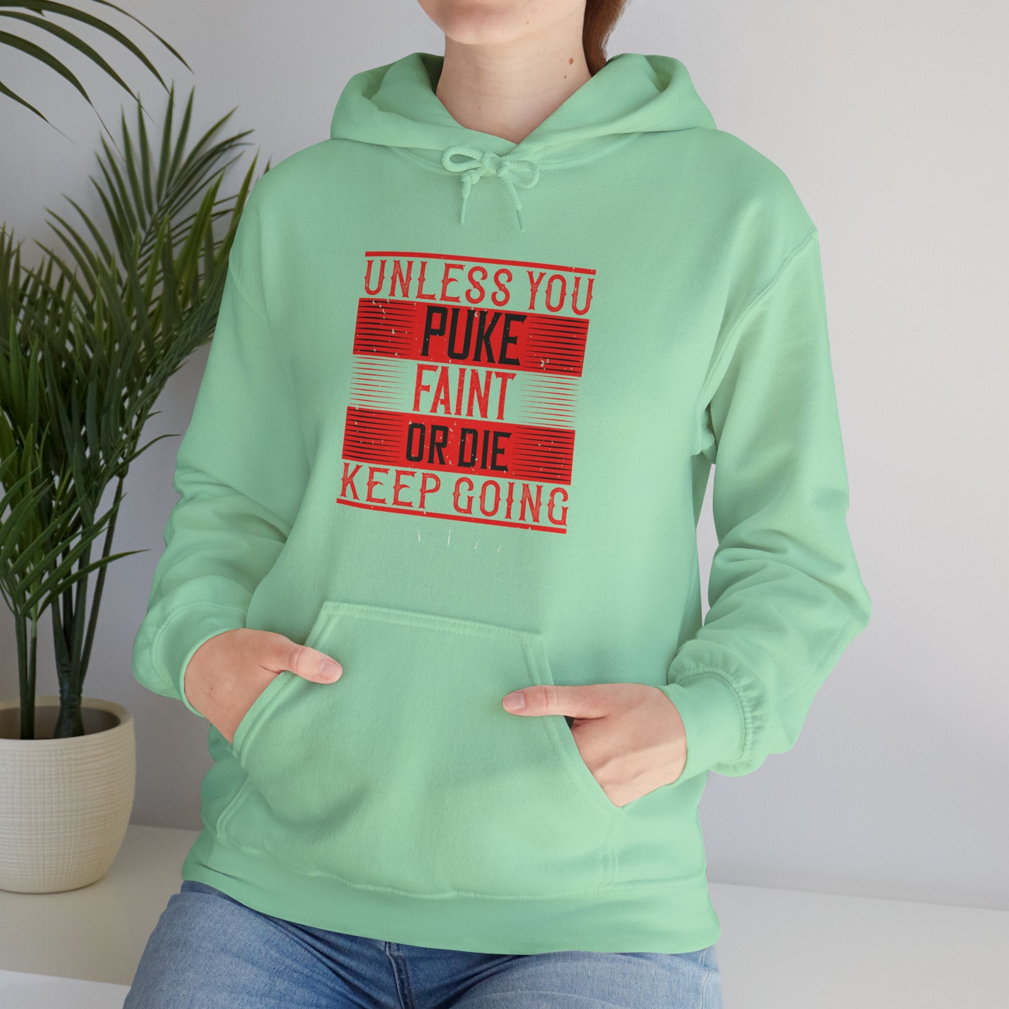 "Unless you puke, faint, or die, keep going" Unisex Heavy Blend™ Hooded Sweatshirt