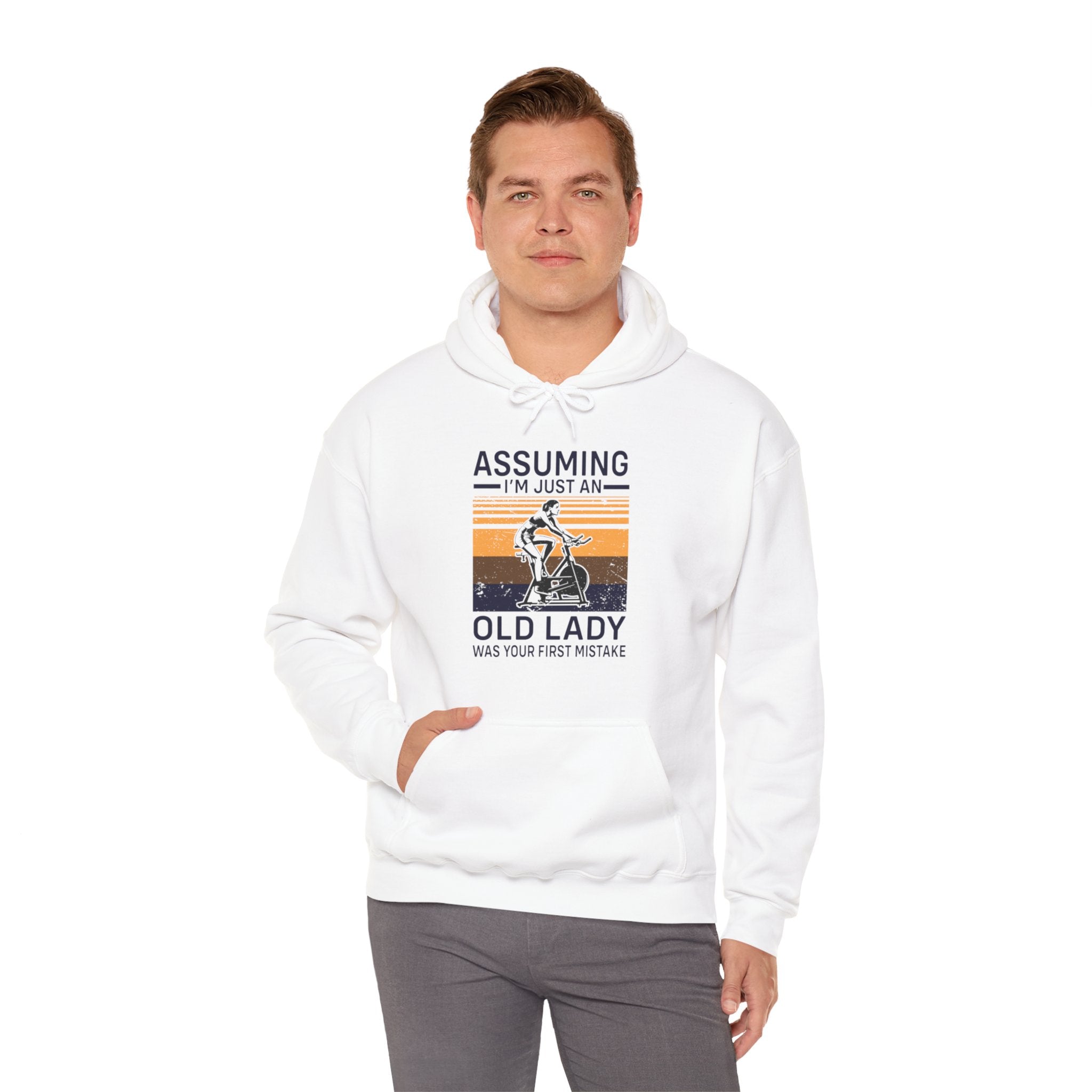 "Assuming I M Just An Old Lady Was Your First Mistake"  Unisex Heavy Blend™ Hooded Sweatshirt