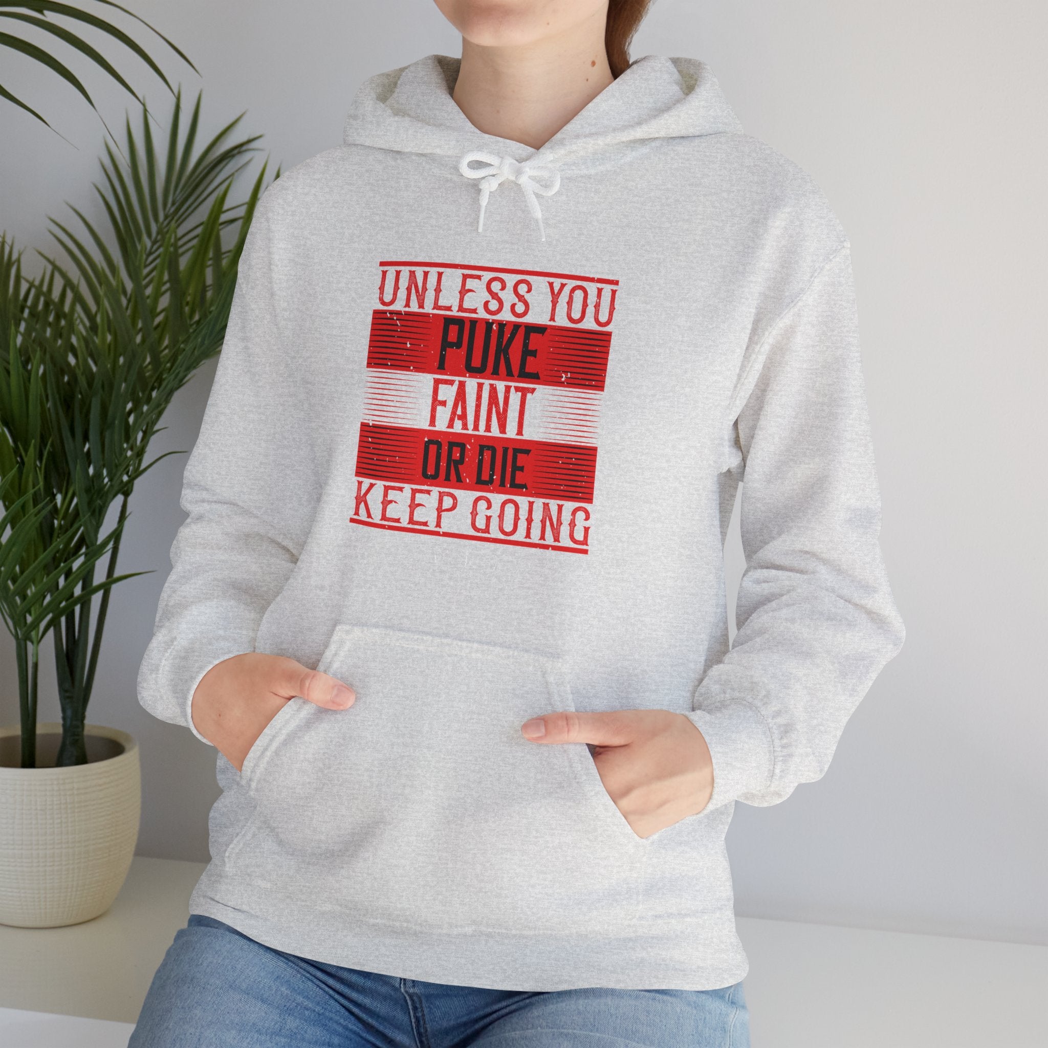 "Unless you puke, faint, or die, keep going" Unisex Heavy Blend™ Hooded Sweatshirt