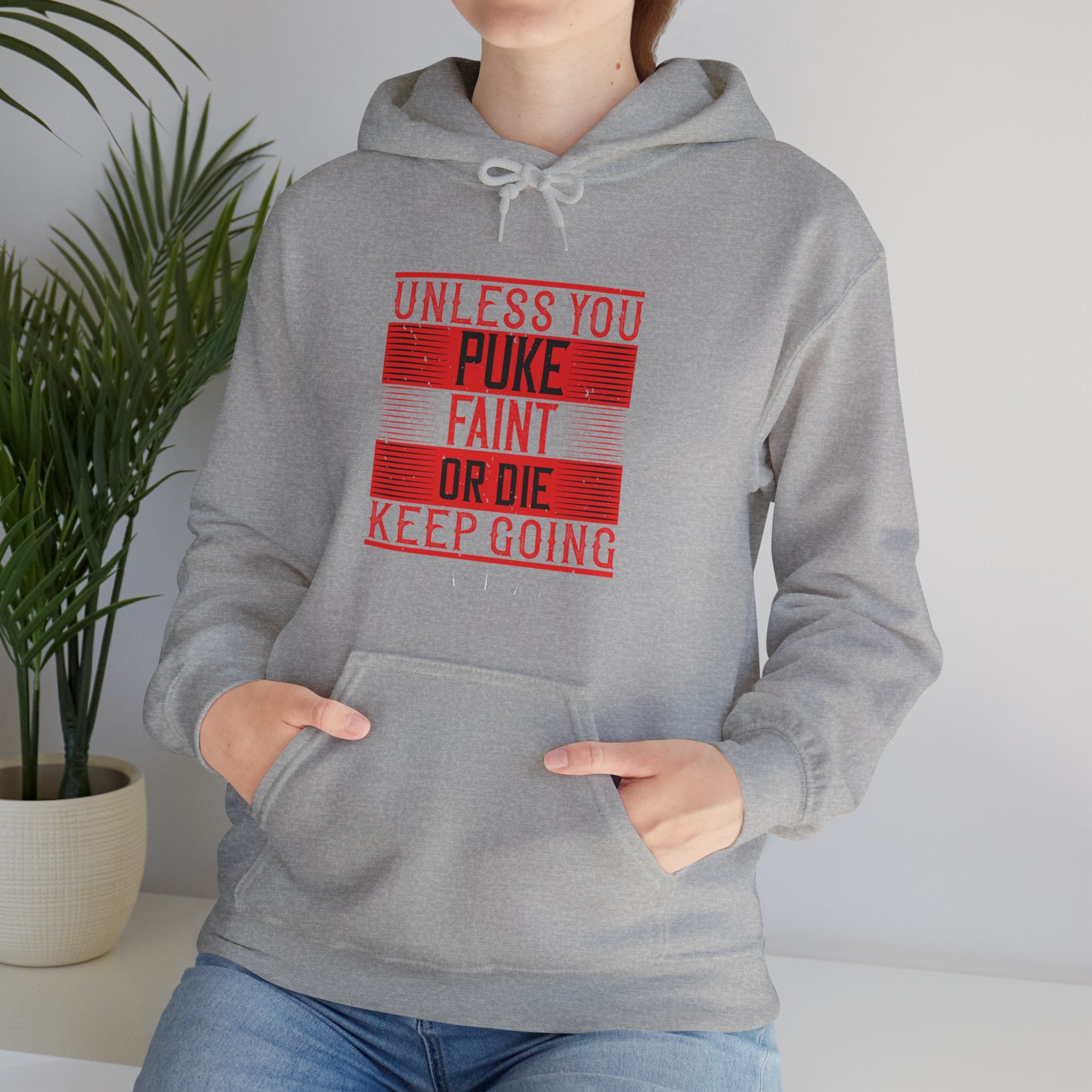 "Unless you puke, faint, or die, keep going" Unisex Heavy Blend™ Hooded Sweatshirt