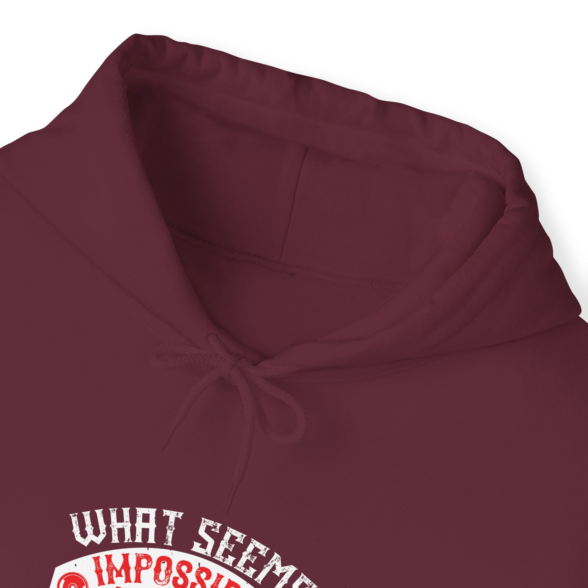 "What seems impossible today will one day become your warm-up" Unisex Heavy Blend™ Hooded Sweatshirt