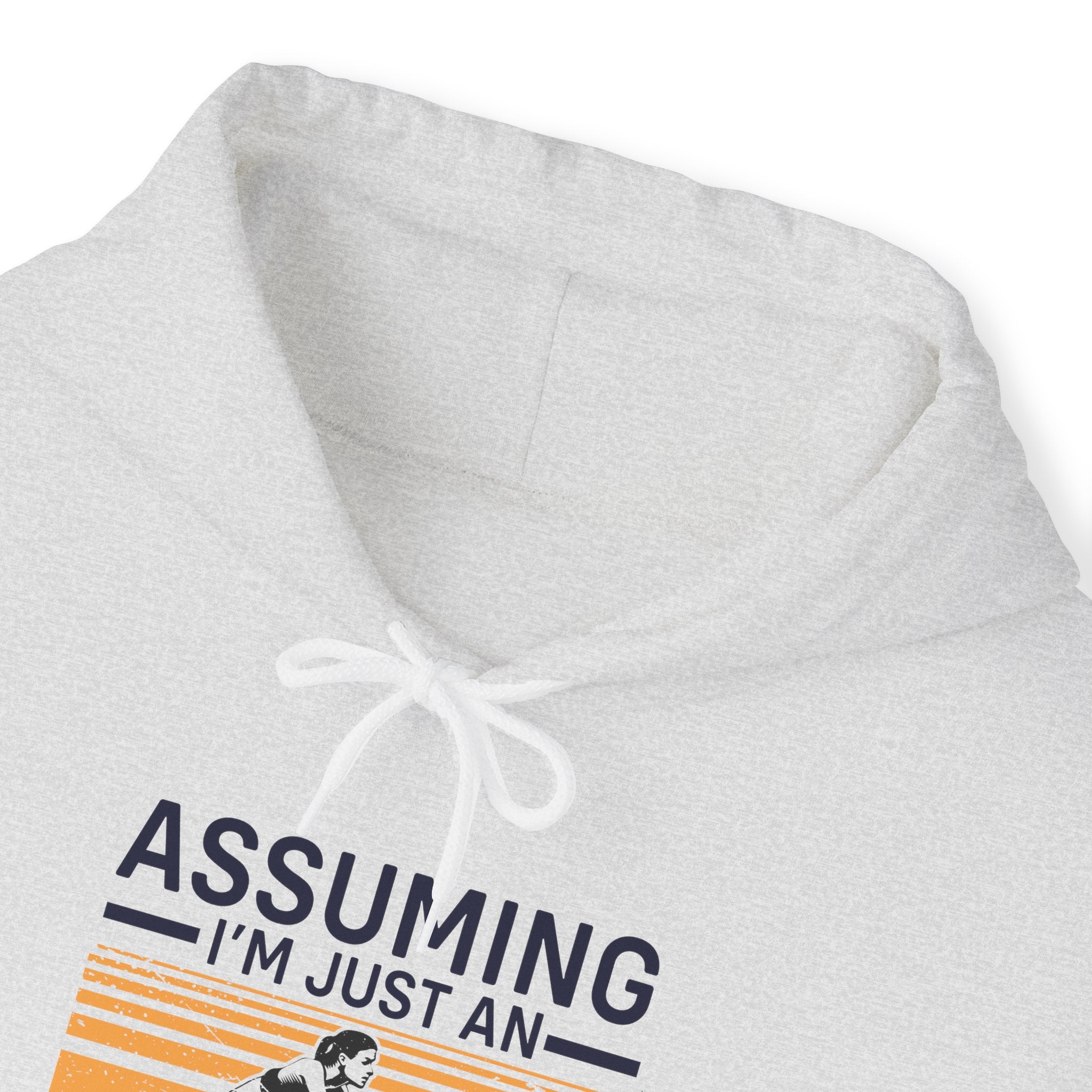 "Assuming I M Just An Old Lady Was Your First Mistake"  Unisex Heavy Blend™ Hooded Sweatshirt