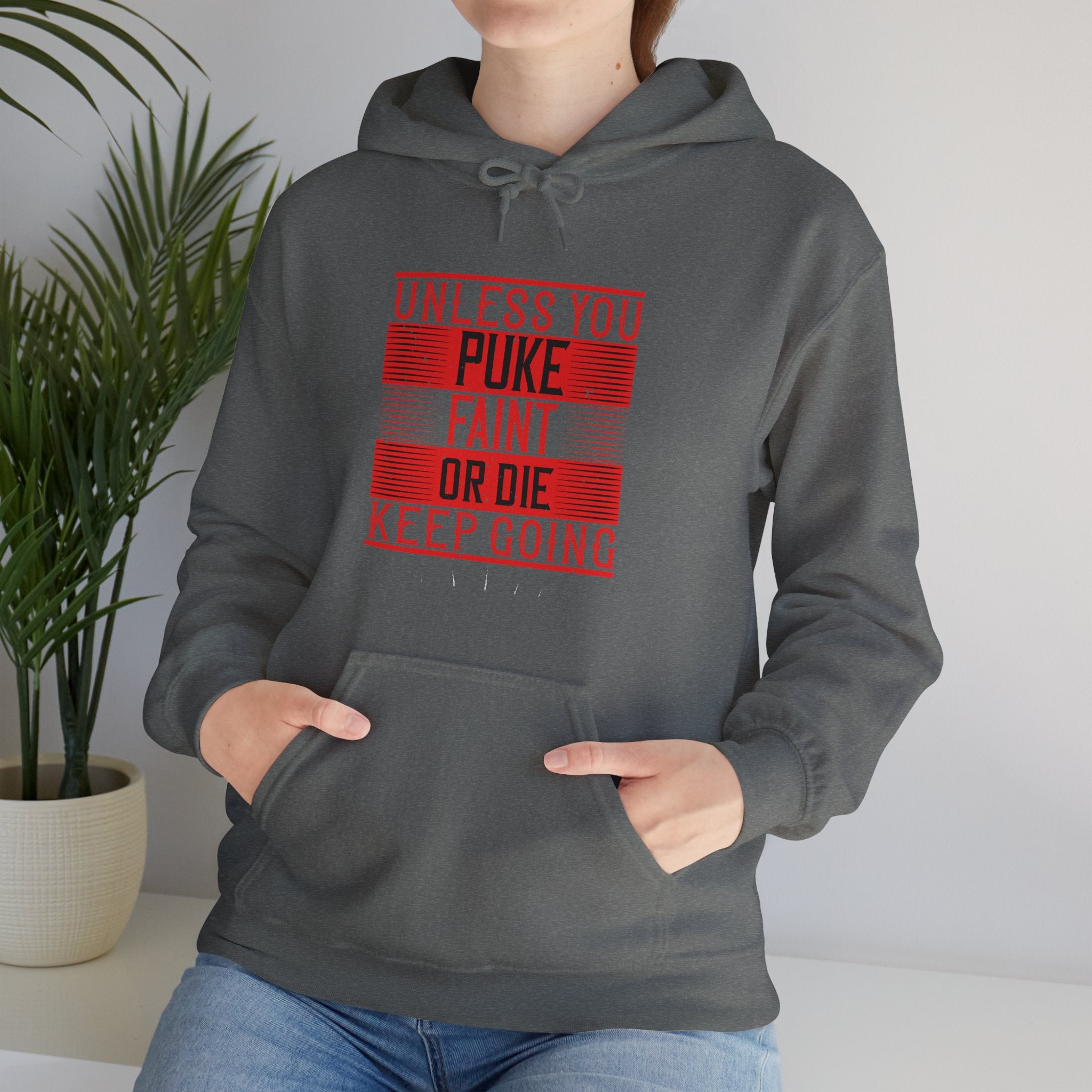 "Unless you puke, faint, or die, keep going" Unisex Heavy Blend™ Hooded Sweatshirt