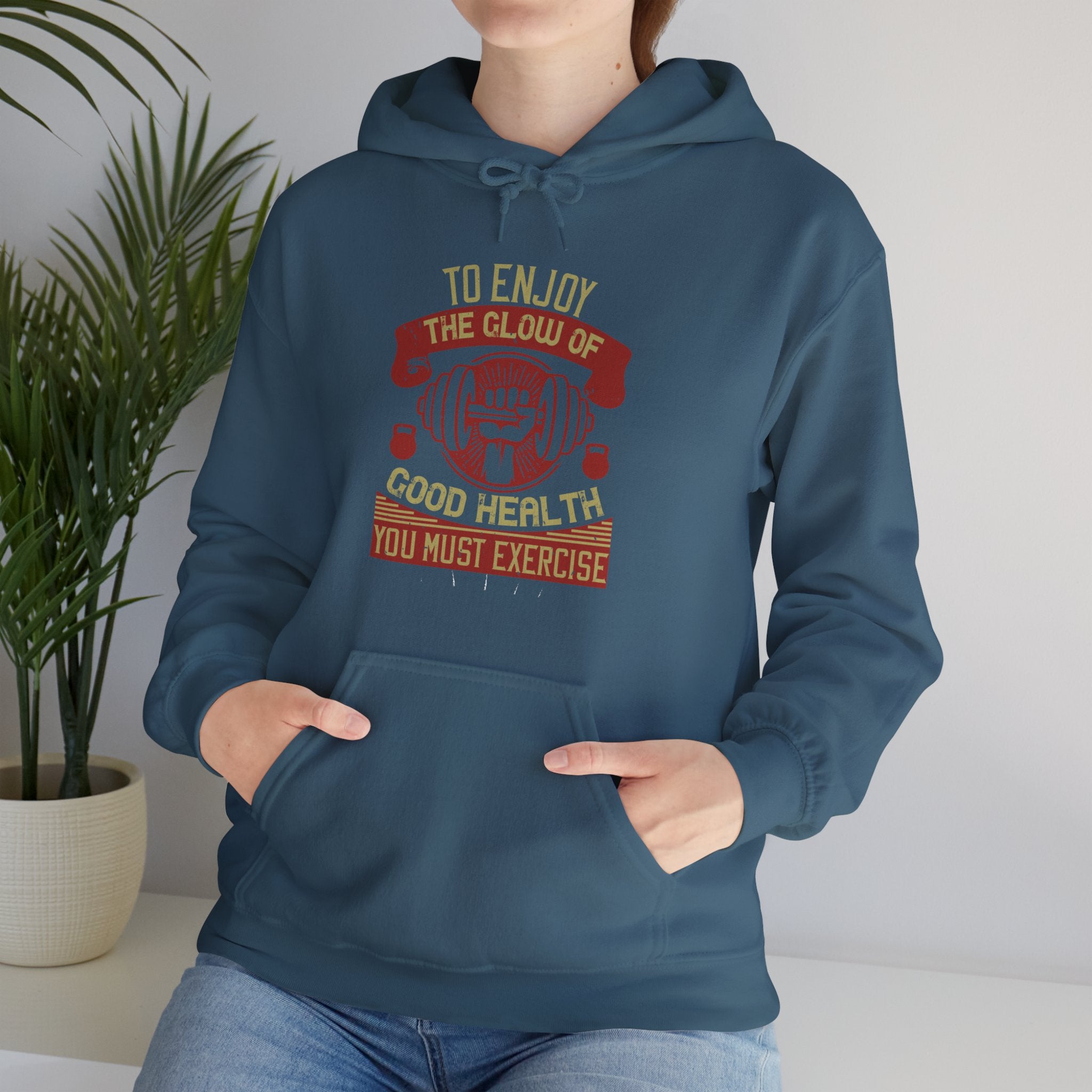 "To enjoy the glow of good health, you must exercise"  Unisex Heavy Blend™ Hooded Sweatshirt