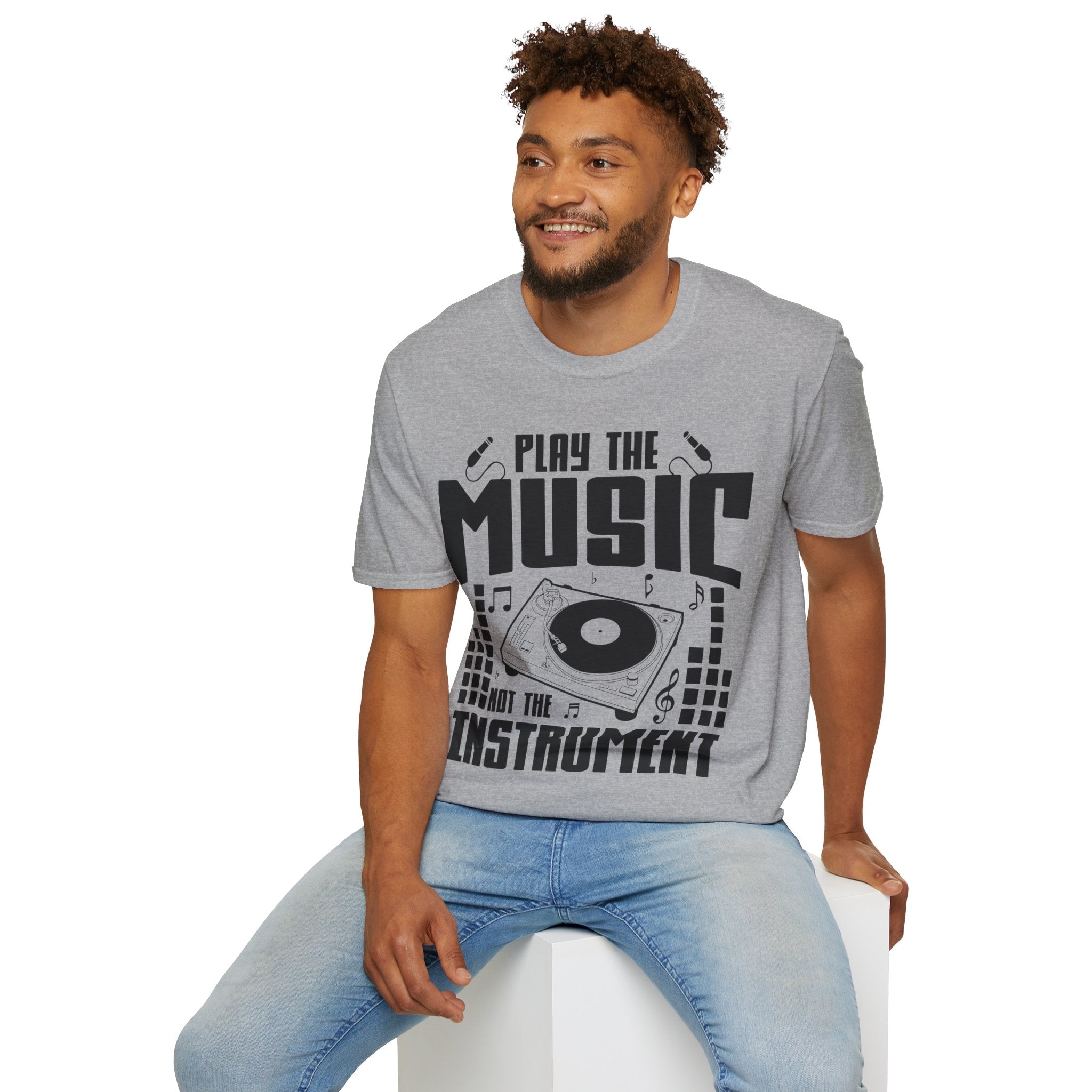 "Play The Music Not The Instrument"  Unisex Soft style T-Shirt